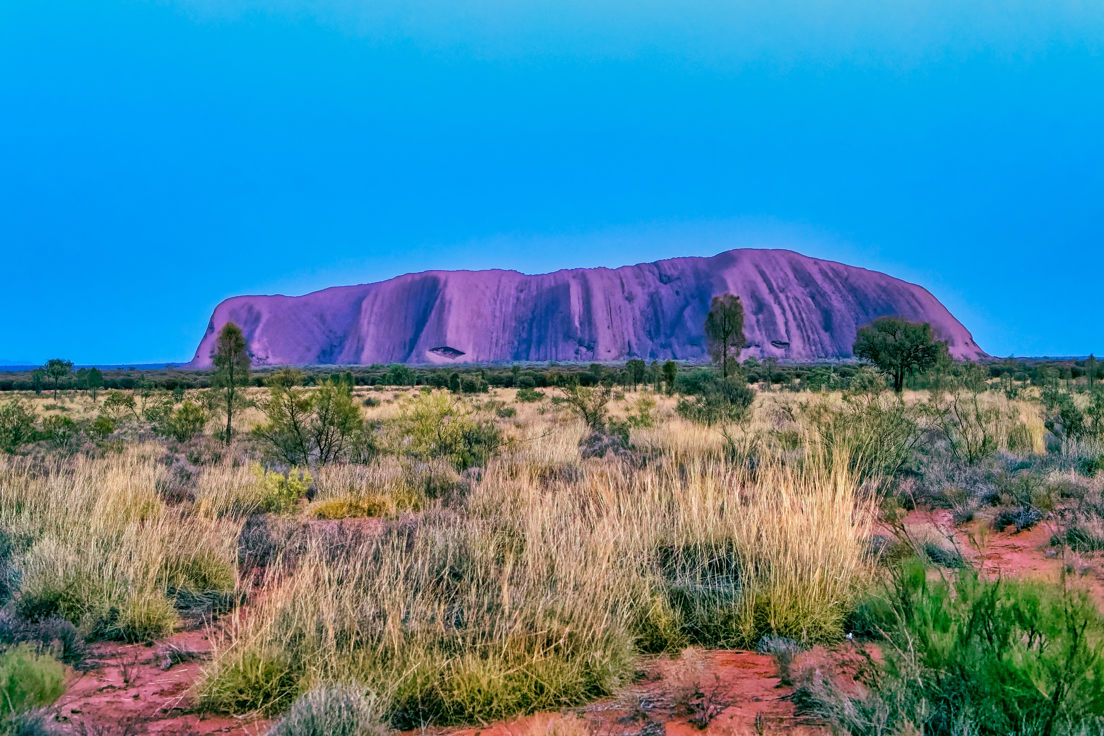 Sonnenaufgang am Uluru im Uluṟu-Kata-Tjuṯa Nationalpark