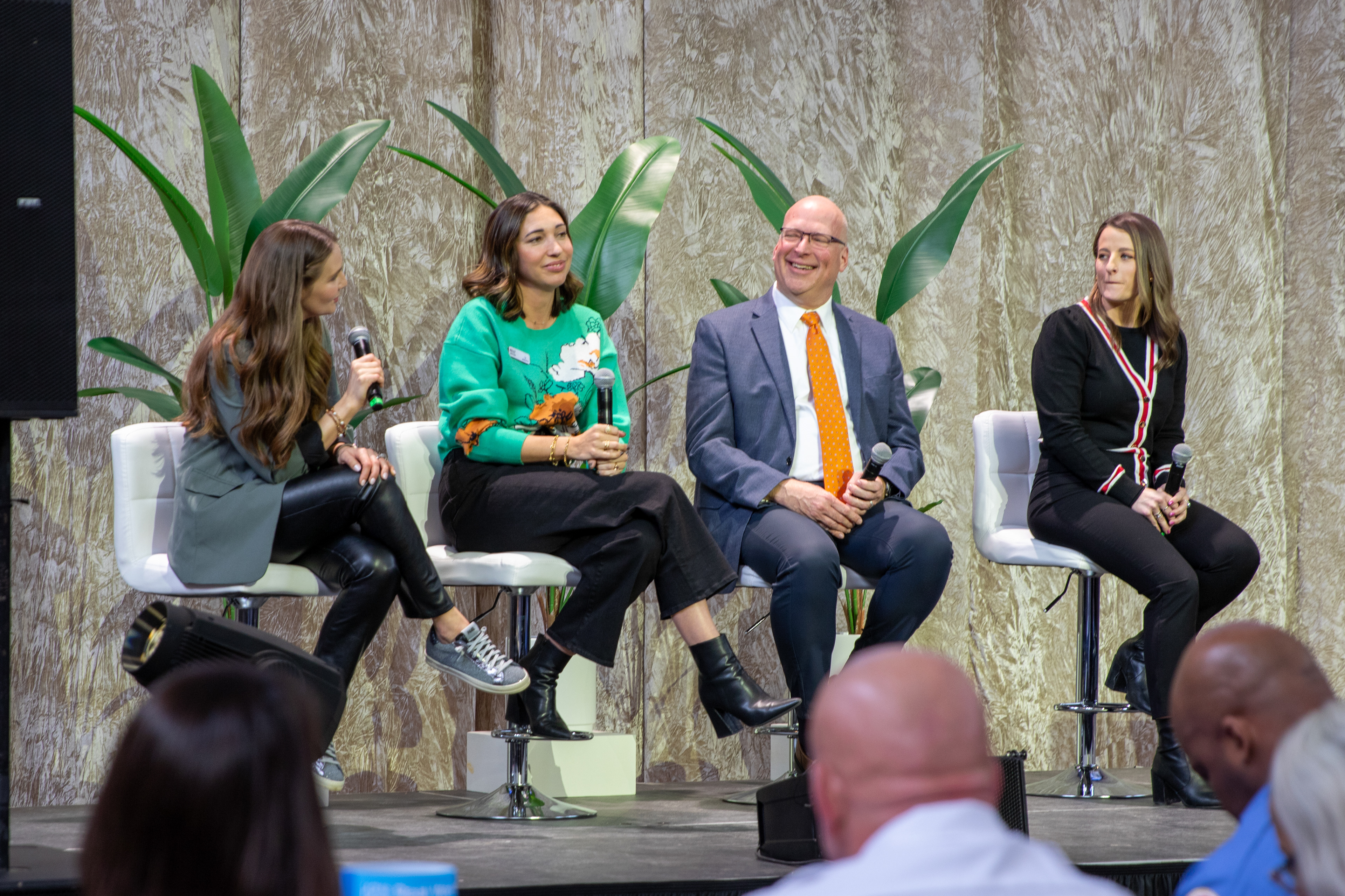 An Industry Impact Employer Panel gather on stage to answer questions regarding how their businesses are interacting with real world learning. 