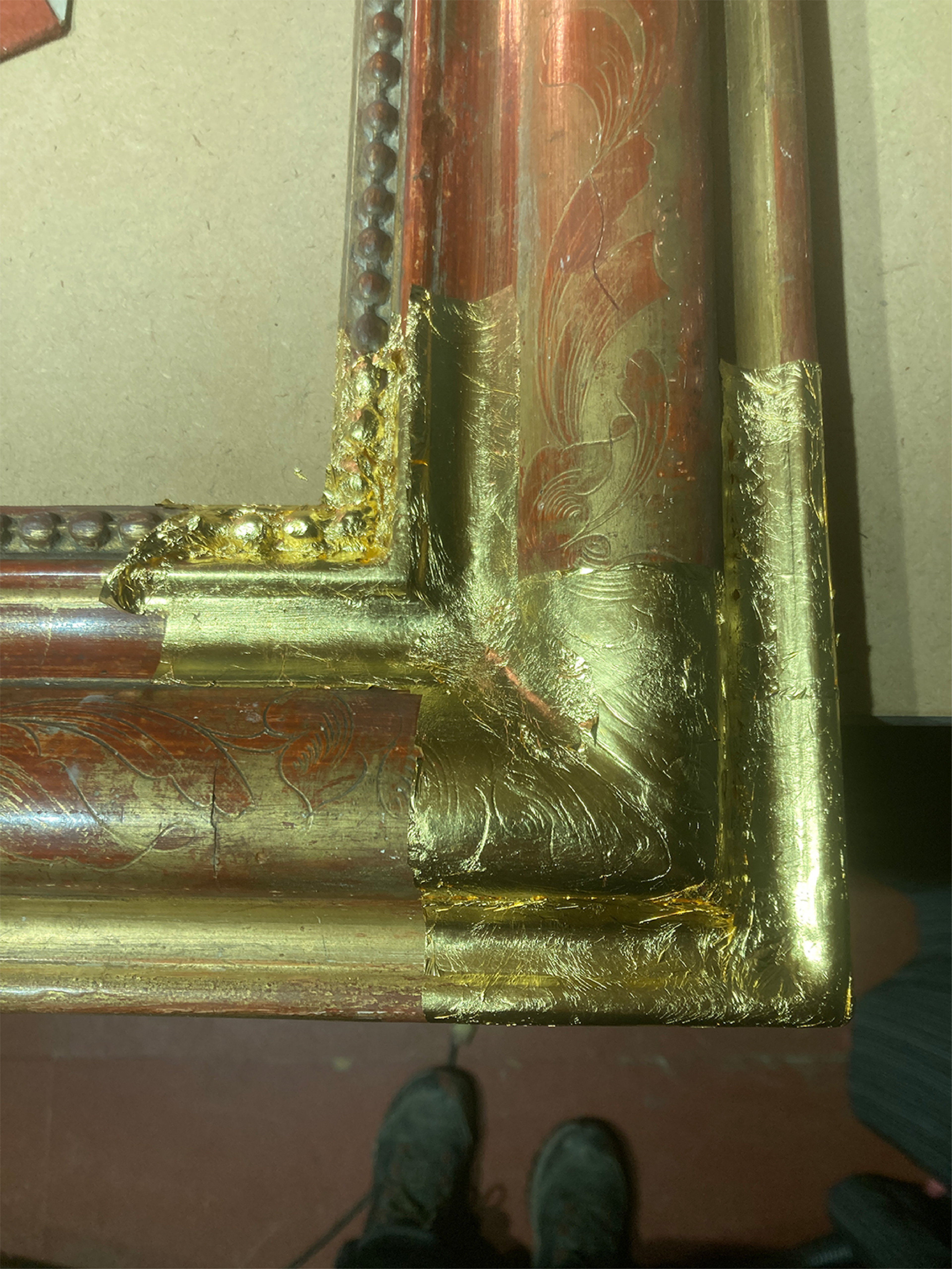 Laying 23.5ct gold leaf