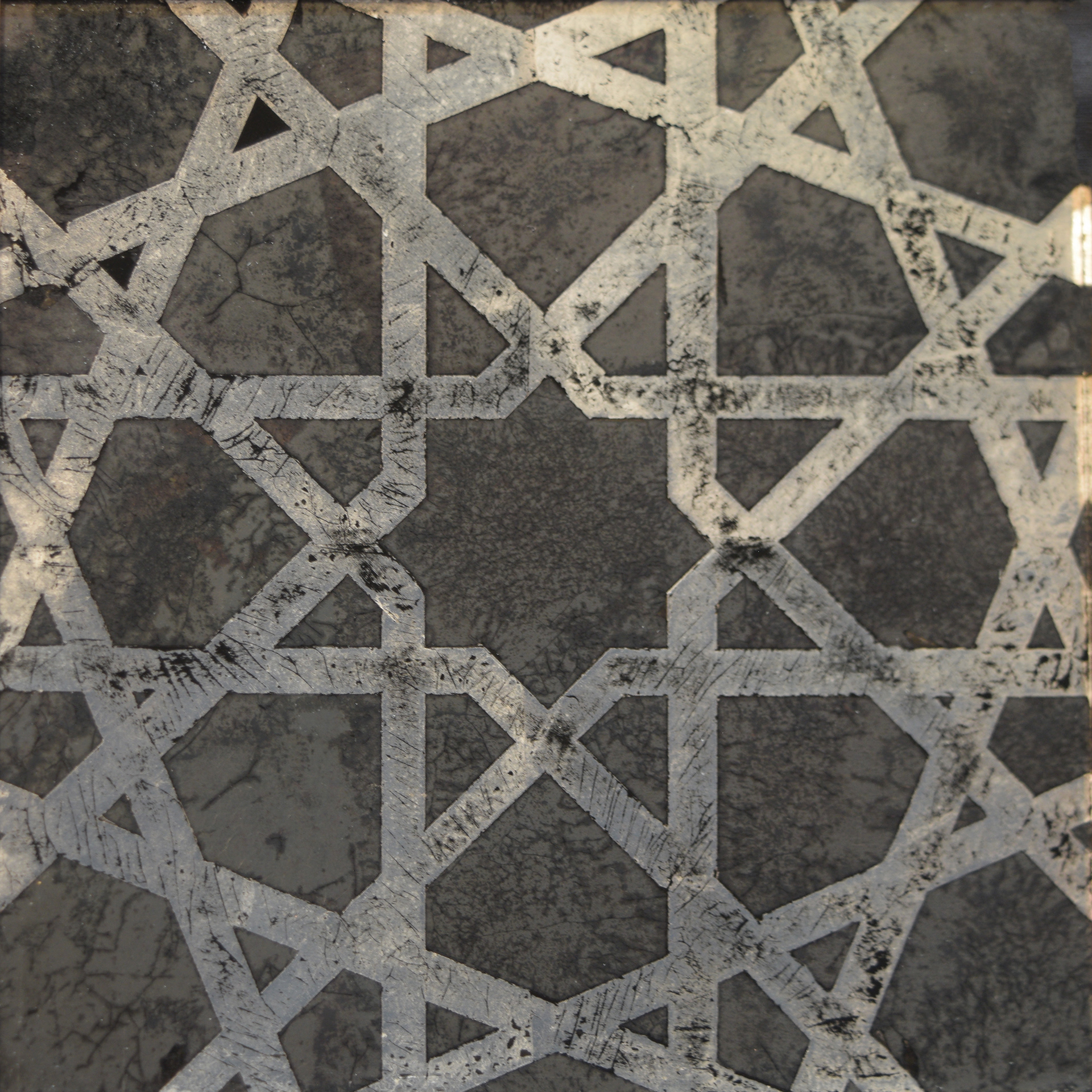 Arabic design - oxidised silver & silver on glass