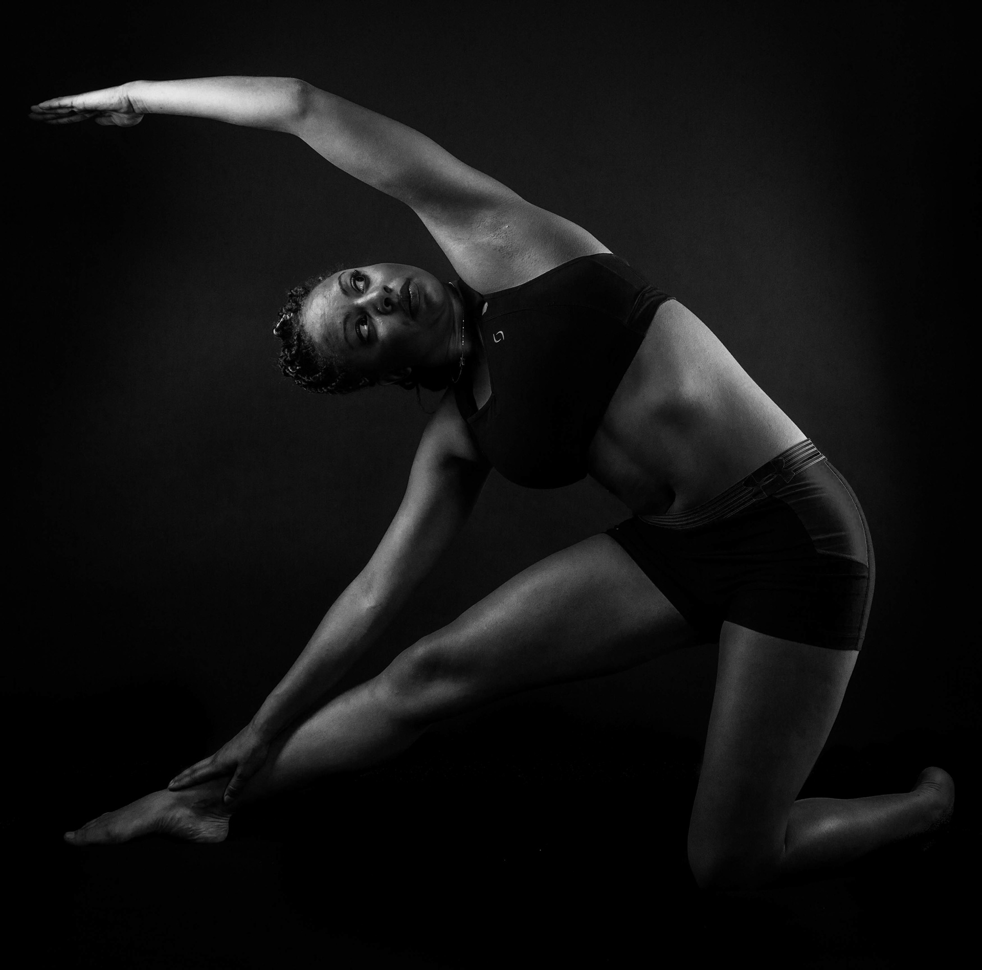 fit woman stretching in yoga pose