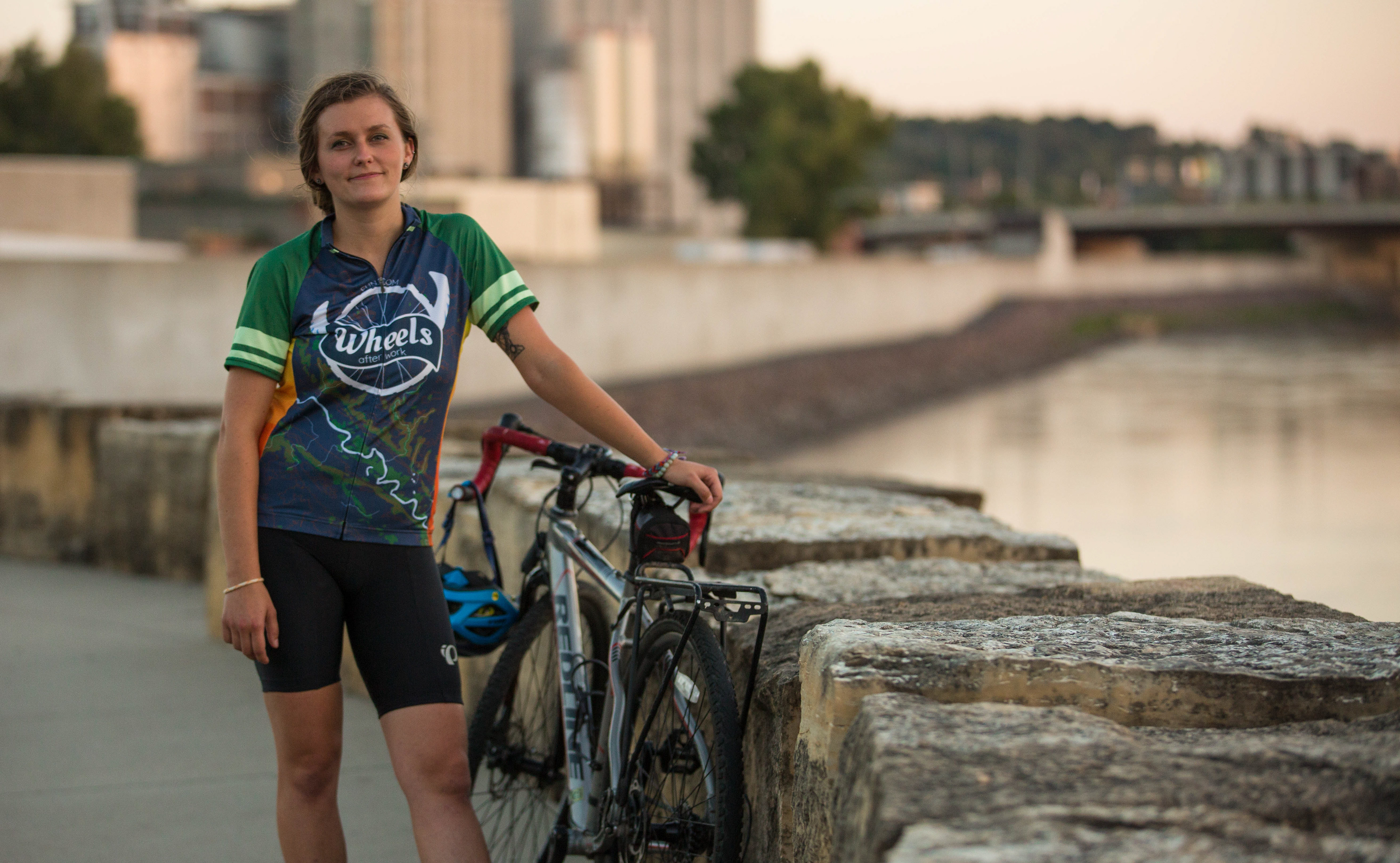 Amanda Anez wearing Wheels After Work bike jersey for fun.com group rides