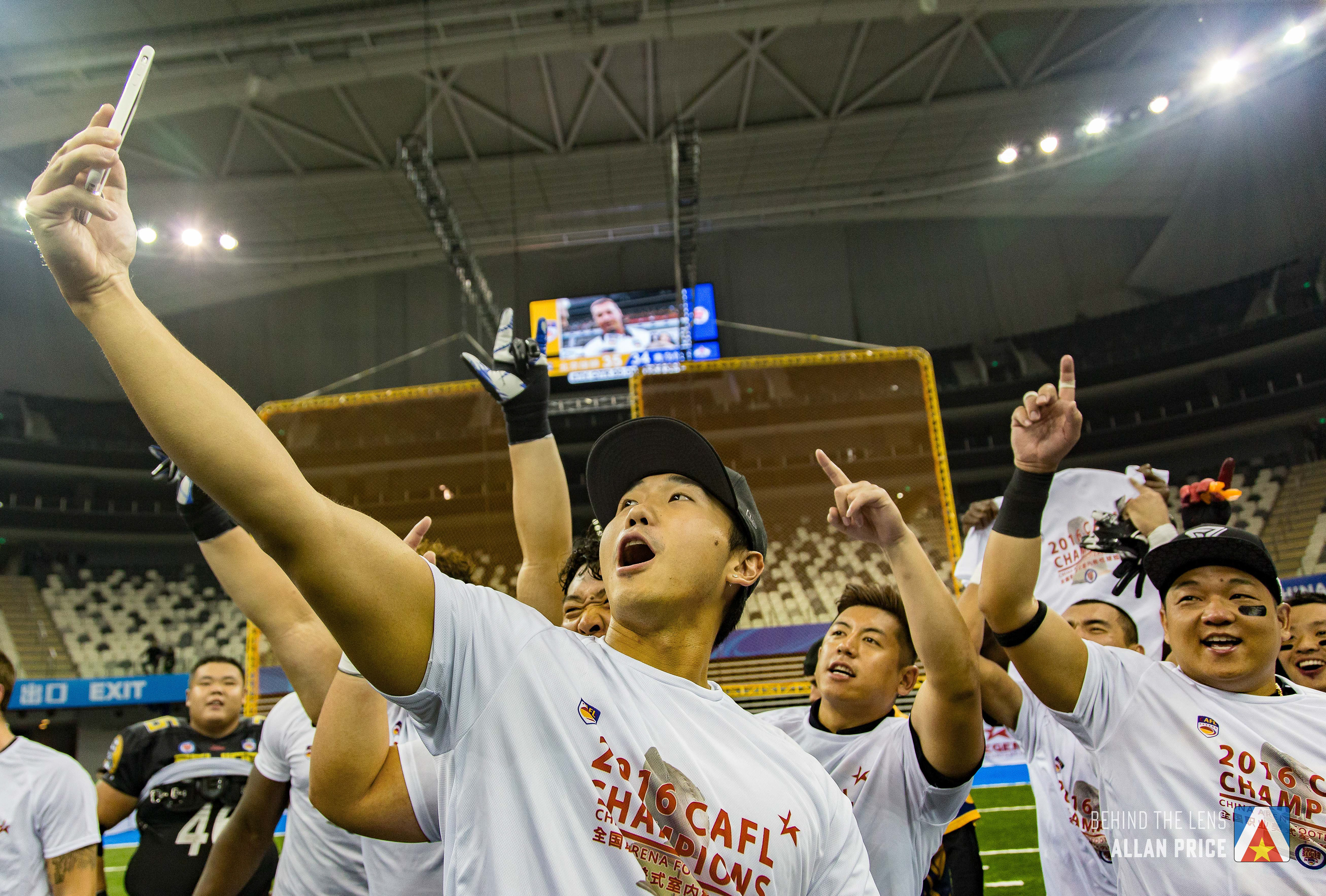 Beijing Lions players celebrate their win