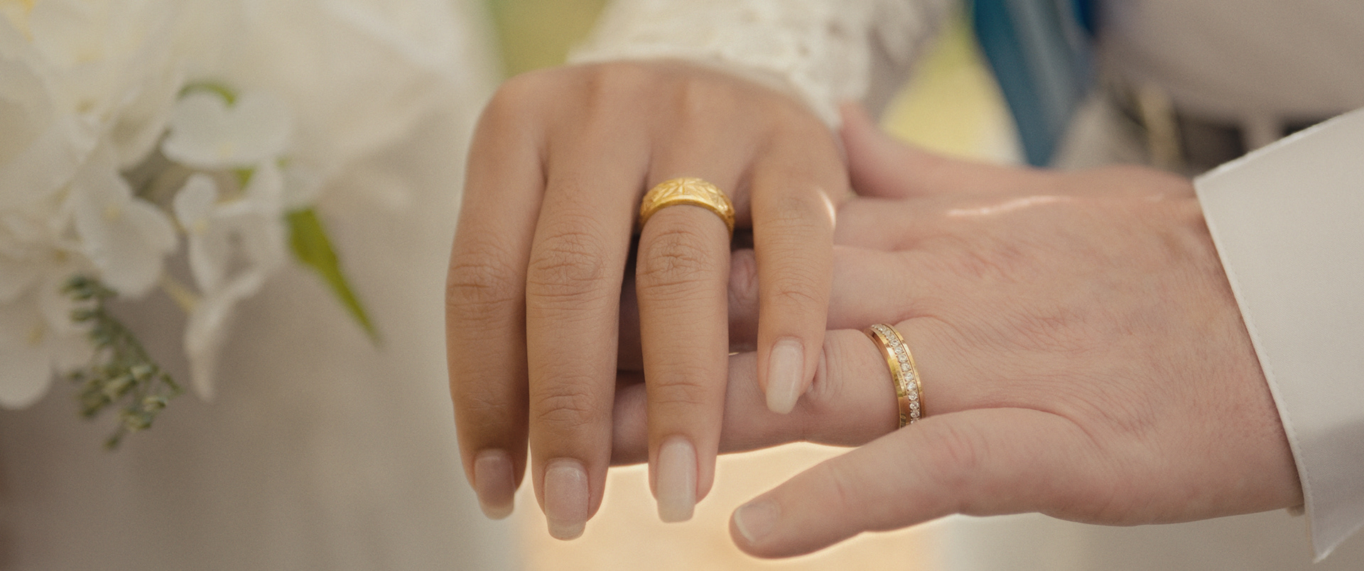 Close-up of the couple’s wedding bands captured after their ceremony in Pocatello, Idaho.