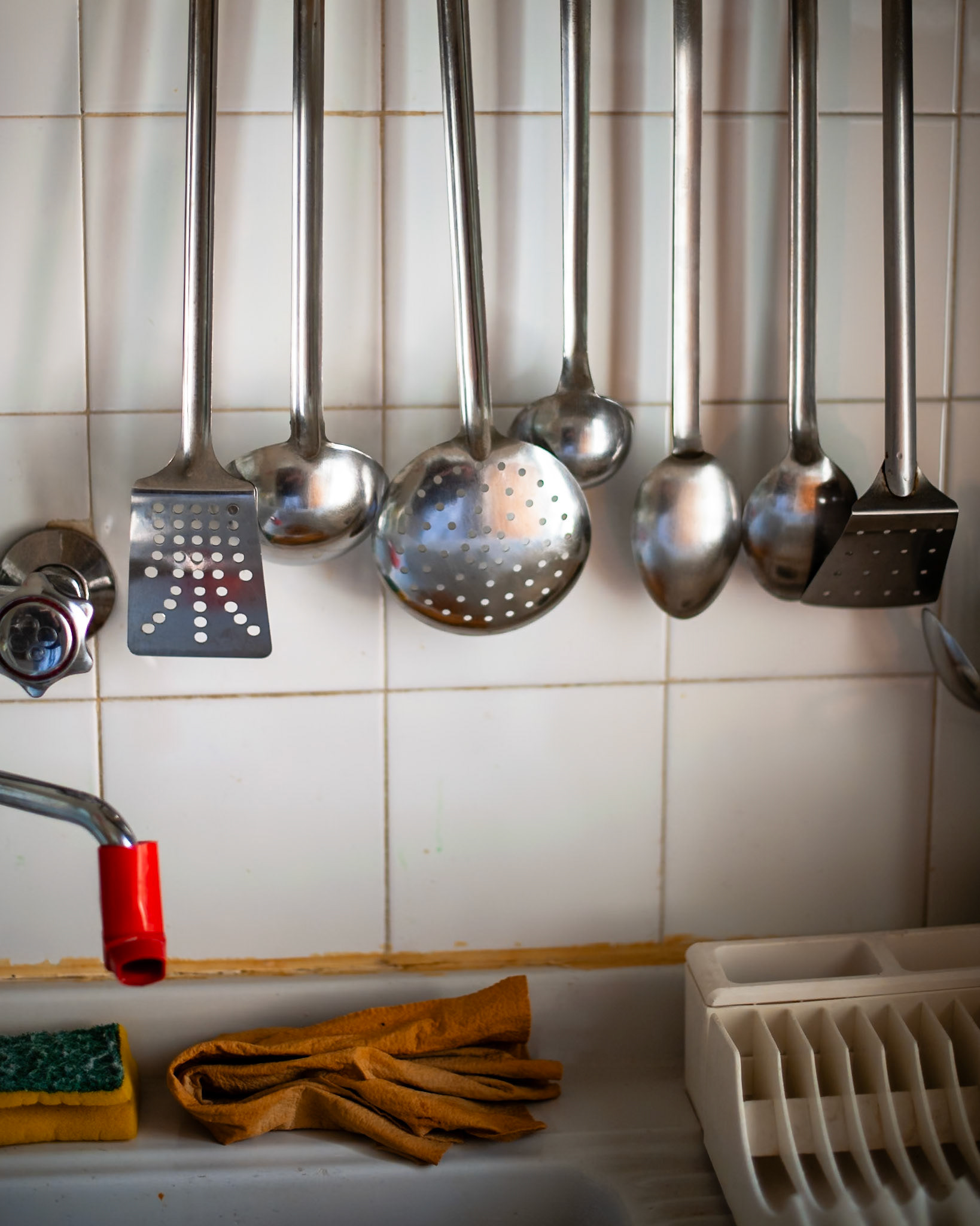 Nonna's utensils hung where she left them.  Always in order.  Always perfectly clean.