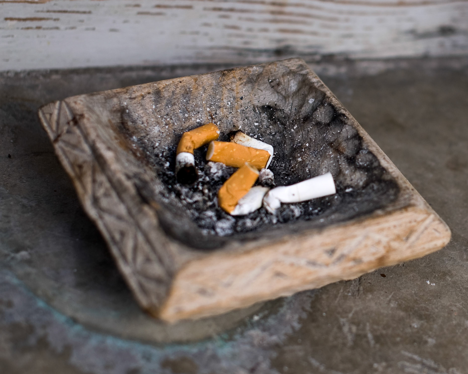 Nonna's ashtray.  Those cigarette butts may have been my mother's or an uncle's, but Nonna smoked most of her life.  