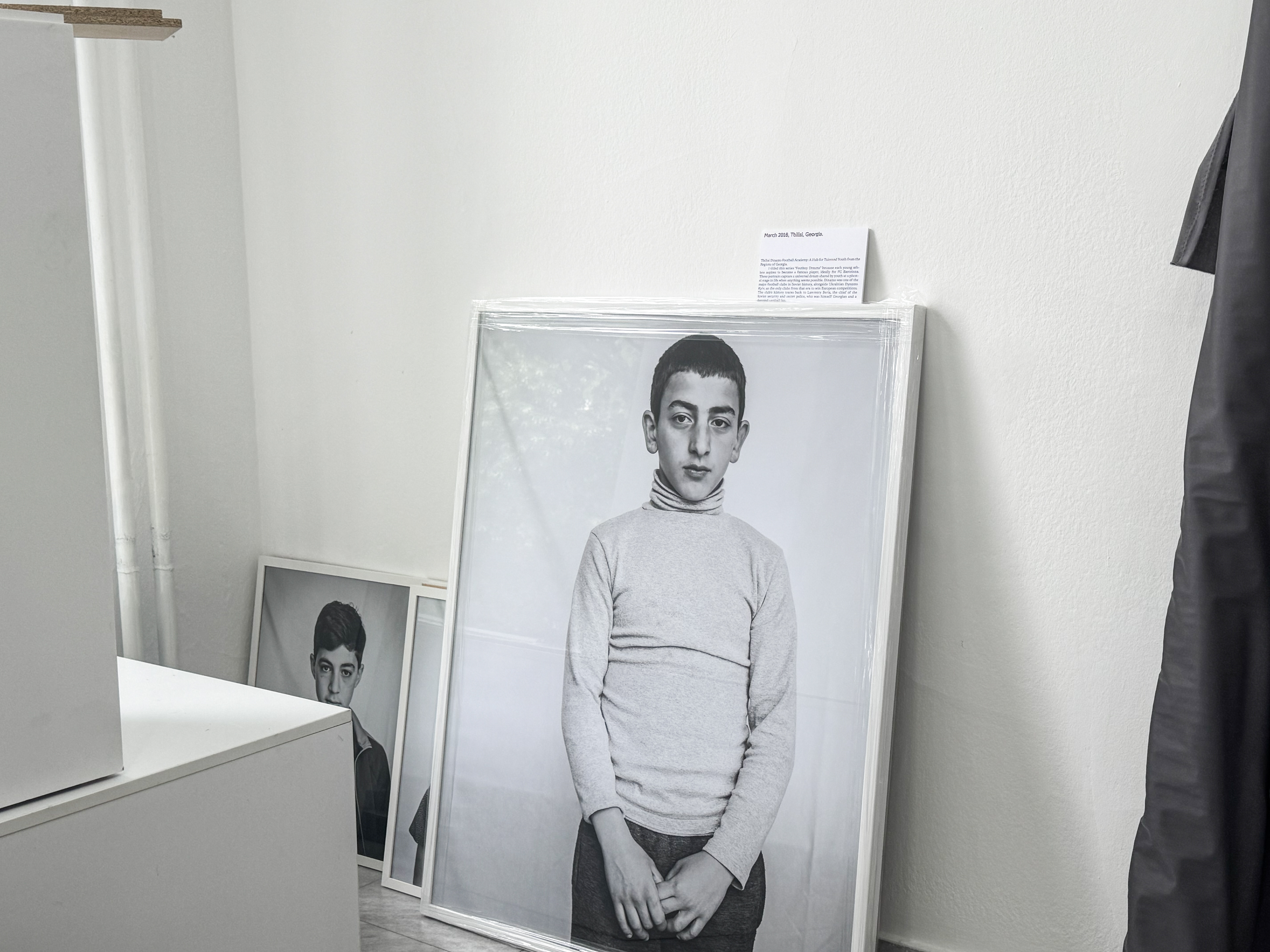 March 2018 , Tbilisi, Georgia.  Tbilisi Dinamo Football Academy: A Hub for Talented Youth from the Regions of Georgia. I titled this series "Footboy Dreams" because each young athlete aspires to become a famous player, ideally for FC Barcelona. These portraits capture a universal dream shared by youth at a pivotal stage in life when anything seems possible. Dinamo was one of the major football clubs in Soviet history, alongside Ukrainian Dynamo Kyiv, as the only clubs from that era to win European competitions. The club’s history traces back to Lawrenty Beria, the chief of the Soviet security and secret police, who was himself Georgian and a devoted football fan. 