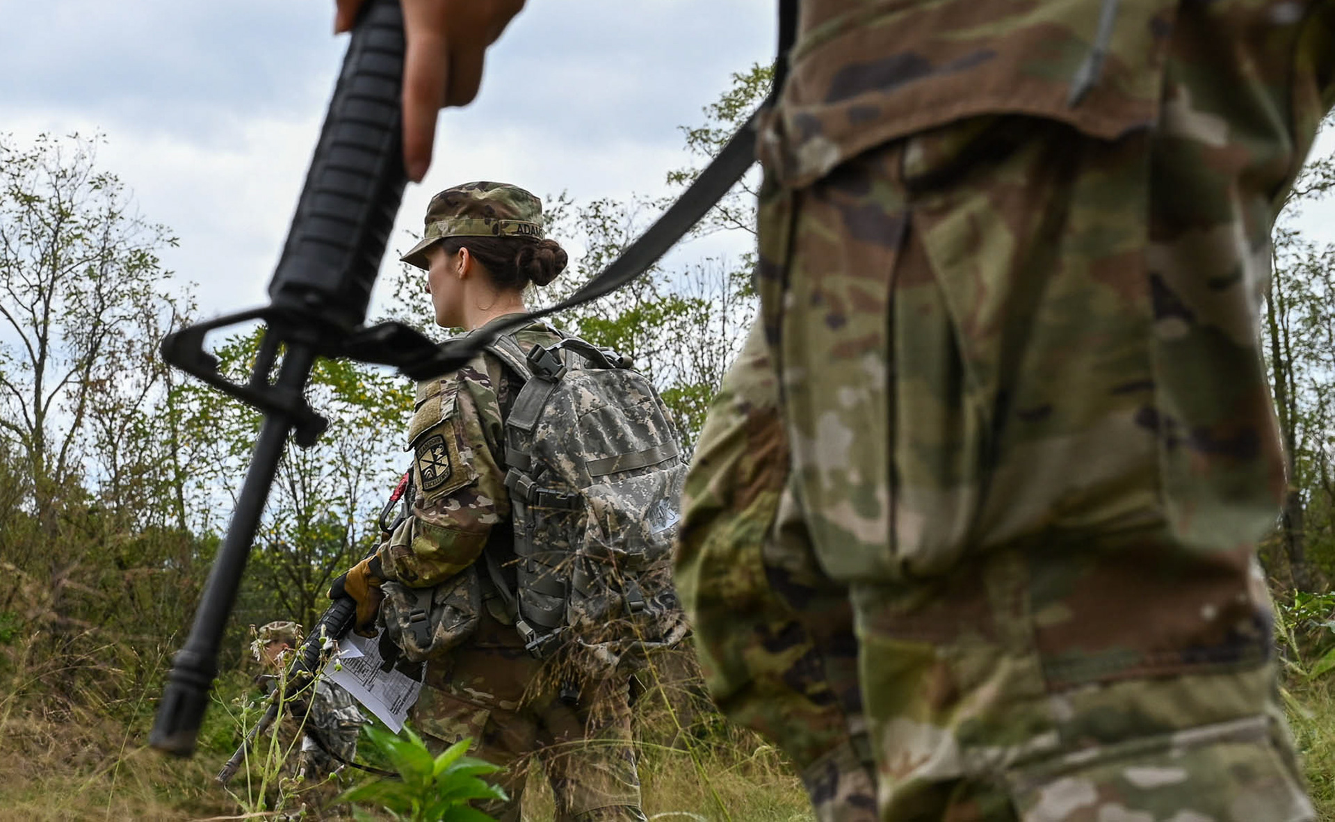 Cadet Arlene Adams walks through a Tactical Combat Casualty Care Lane at The Ridges on Sept. 25, 2024. Each field training session focuses on a different military tactic, including TCCC, land navigation, rappelling, as well as ambush, attack, and defense tactics. Throughout the semester, cadets are not only trained in these critical skills but are also tasked with leading their peers. As they progress in the ROTC program, cadets gain a deeper understanding of their future roles as officers—responsible for planning, assigning tasks, and ensuring that work is completed to the highest standard.