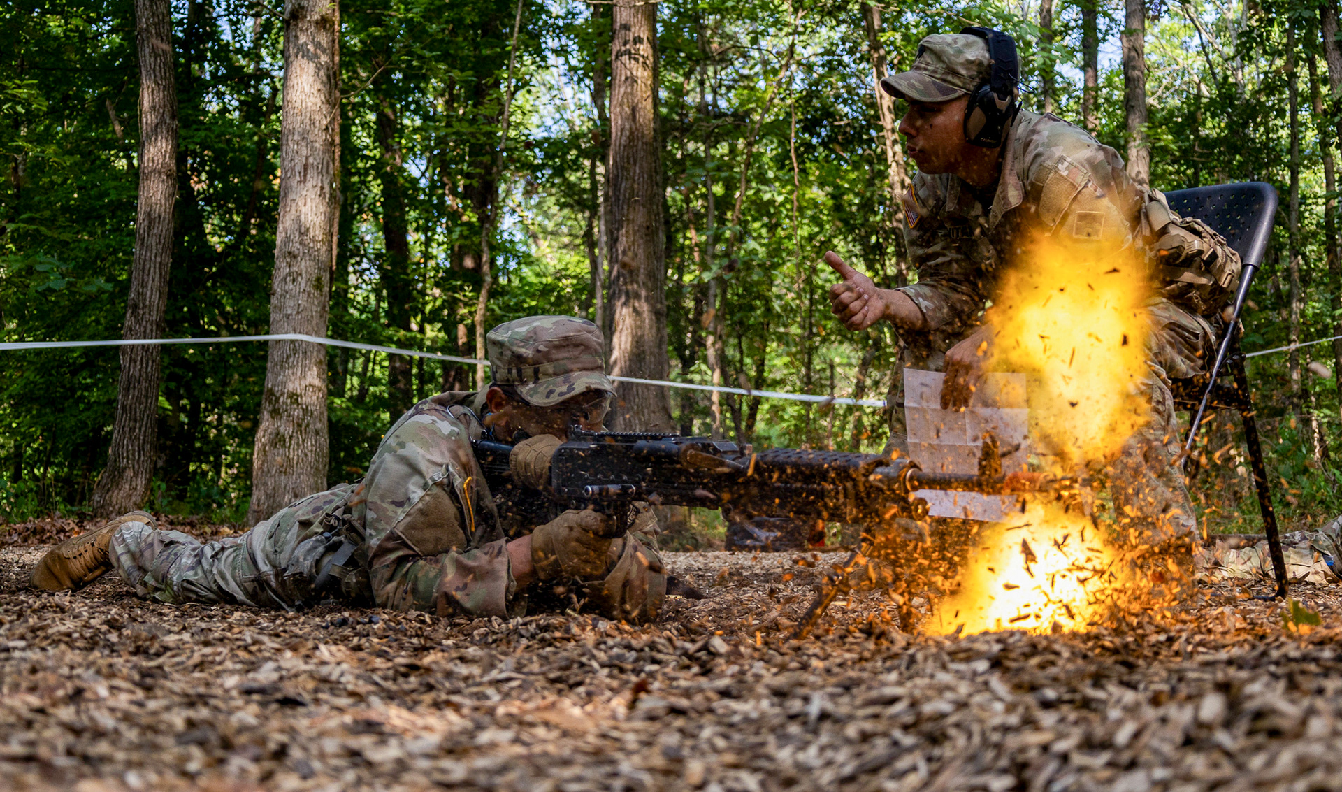 Cadet Oscar Carranza from Texas State University, with 4th Regiment, Advanced Camp, operates a M240B machine gun on Fort Knox, KY., June 30, 2024. Cadets will initially fire blanks from the weapon and subsequently apply their training to effectively clear any malfunctions, ensuring the weapon is swiftly restored to operational status. |Photo Credit: Ayiana Andrella, Ohio University, CST Public Affairs Office