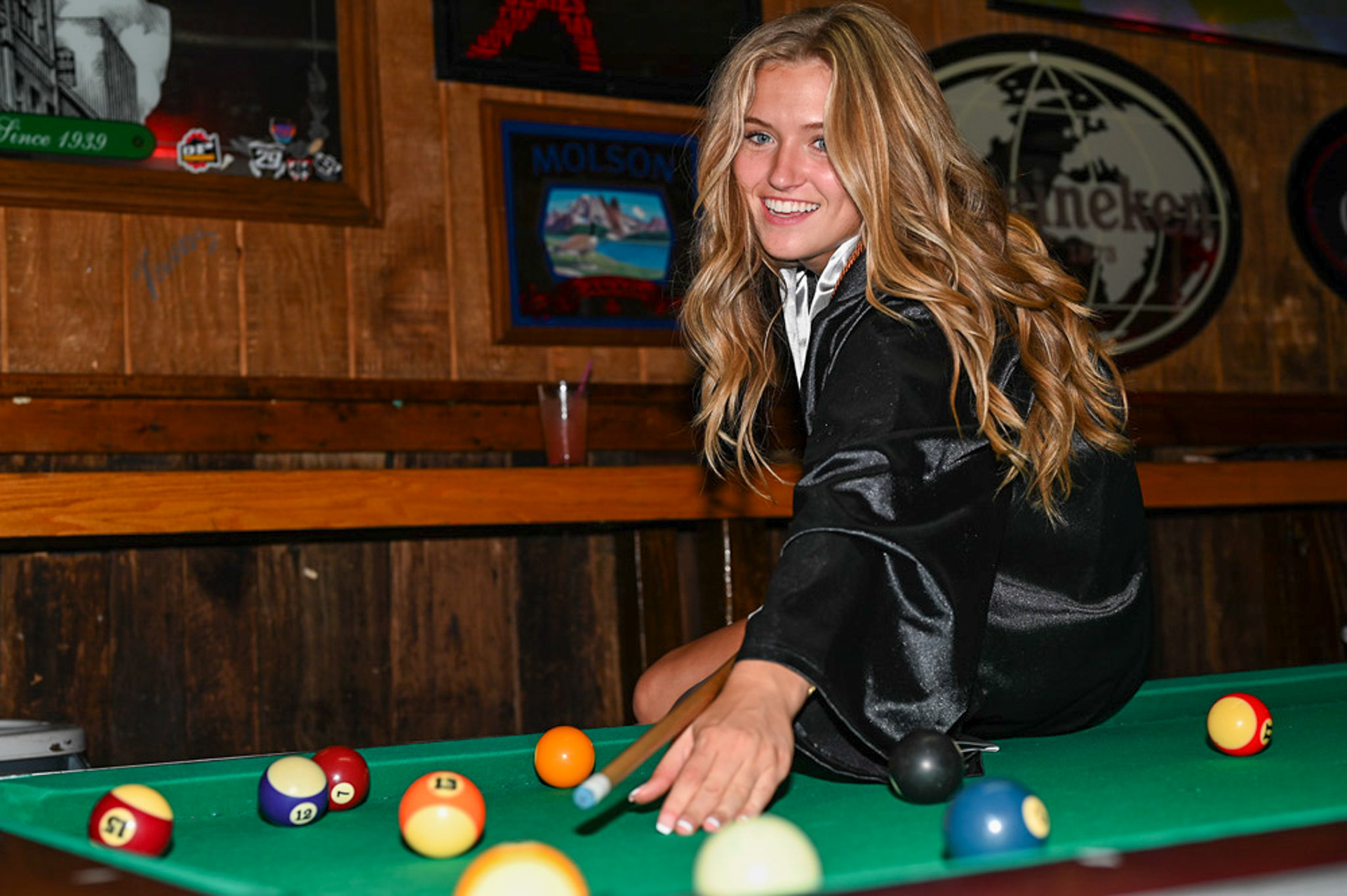 Aubrey Rea plays pool at The C.I. in Athens, Ohio, on Saturday, April 27, 2024.