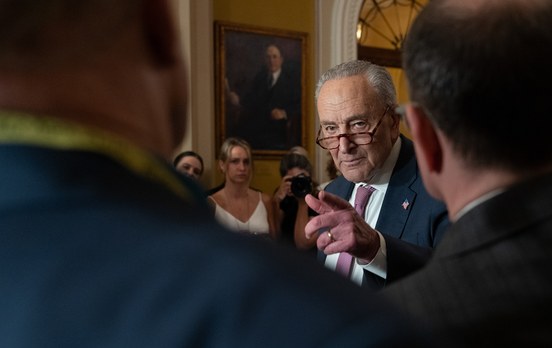Chuck Schumer, Minority Leader of the United States Senate, points at a journalist during a Senate Democratic Leadership media availability in Washington, D.C., on June 24, 2025. Senator Schumer addressed reporters, expressing concerns about President Trump's ‘one big, beautiful bill’ progressing through the Senate and expressing disapproval of the administration’s cancellation of a classified briefing on U.S. airstrikes targeting Iran’s nuclear facilities.