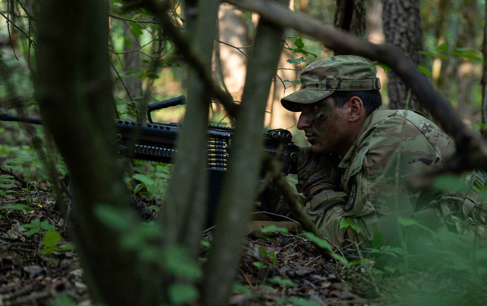 Cadet Shannon Lange from Boise State University, ID., with 1st Regiment, Advanced Camp, undergoes the dry run portion of his mission as part of their Panther phase of the Field Training Exercise on Fort Knox, KY., June 21, 2024. A dry run is a practice session where Cadets go through the motions of an operation or procedure without using any actual hazardous materials. In a dry run, ear and eye protection are typically not required because no live ammunition or explosives are in use. The focus of these exercises is to learn leadership, coordination, and communication when in the field. | Photo Credit: Ayiana Andrella, Ohio University, CST Public Affairs Office