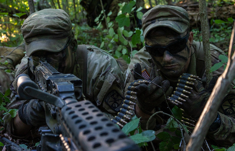 Cadet William McGrath from Texas A&M University and Cadet Mackenzie Collins from Pennsylvania College of Technology with 2 nd Regiment, Advanced Camp, engage in an ambush lane exercise during their Field Training Exercise Wolverine on Fort Knox, Ky., June 24, 2024. In this lane Cadets have a support by fire element and two assault elements to defeat four enemies, this exercise emphasizes the utilization of proper communication and calls. |Photo Credit: Ayiana Andrella, Ohio University, CST Public Affairs Office