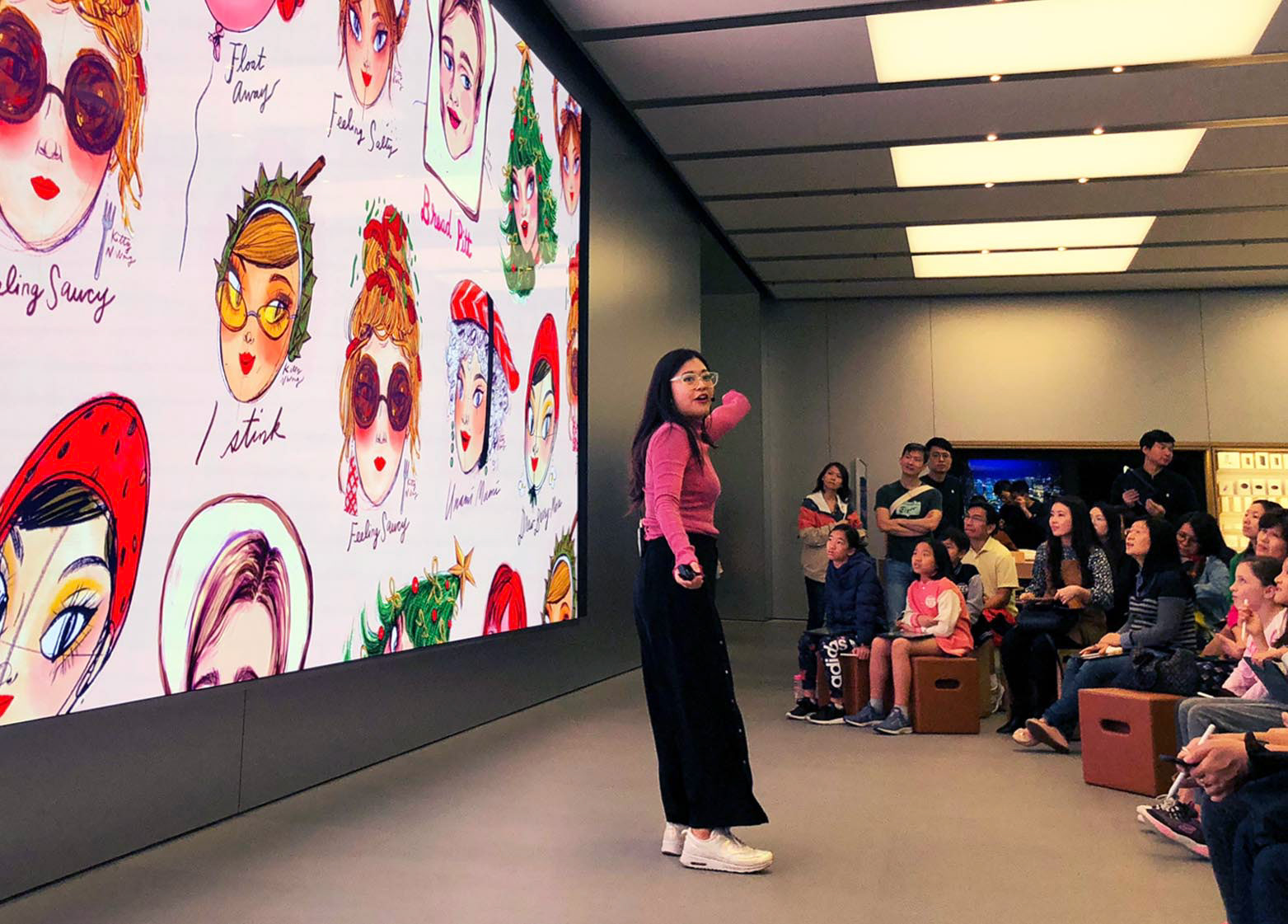 HK fashion illustrator Kitty Wong giving speech to Apple Store audience in CWB