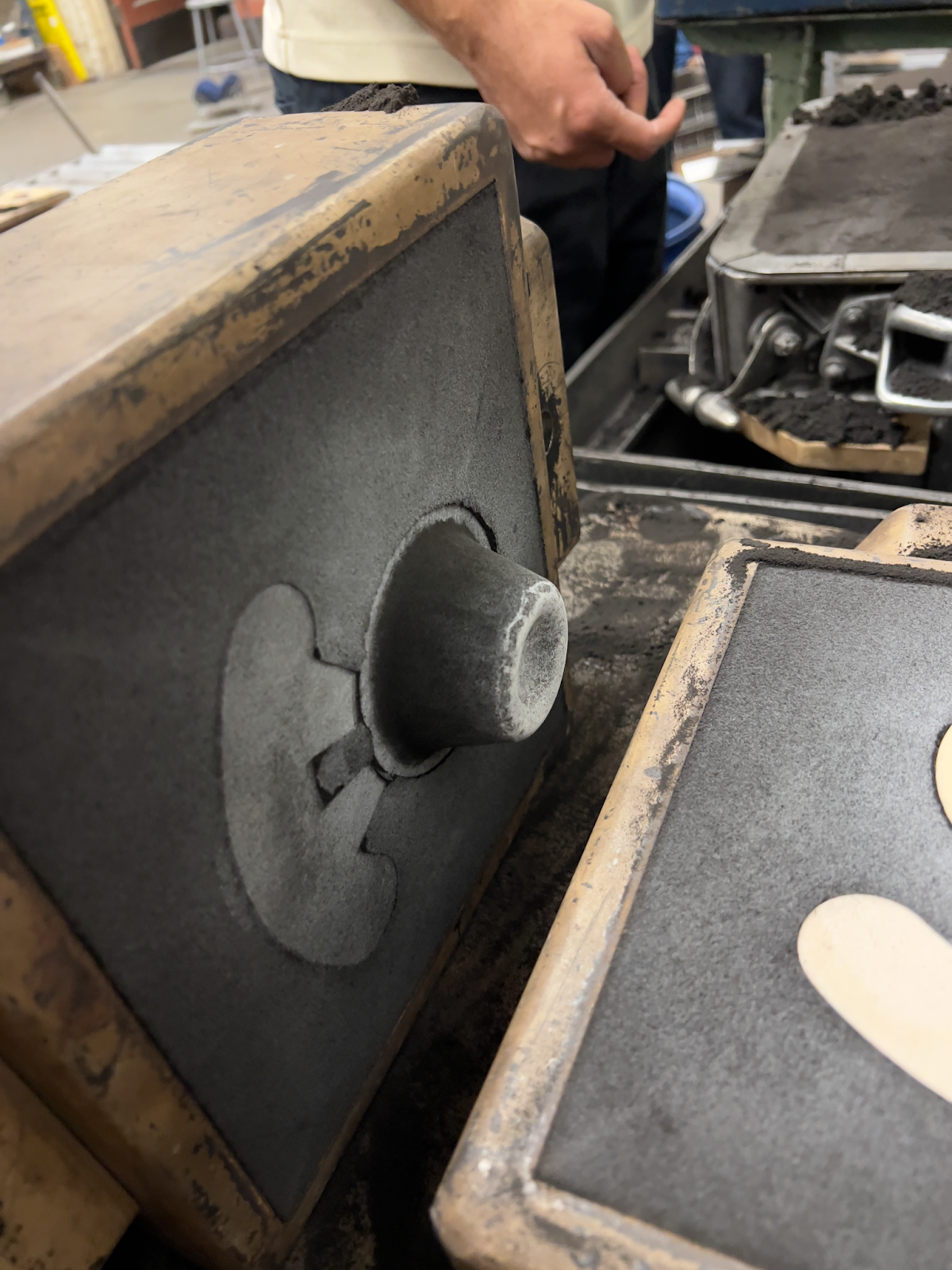 The ramming up process for the top cup.