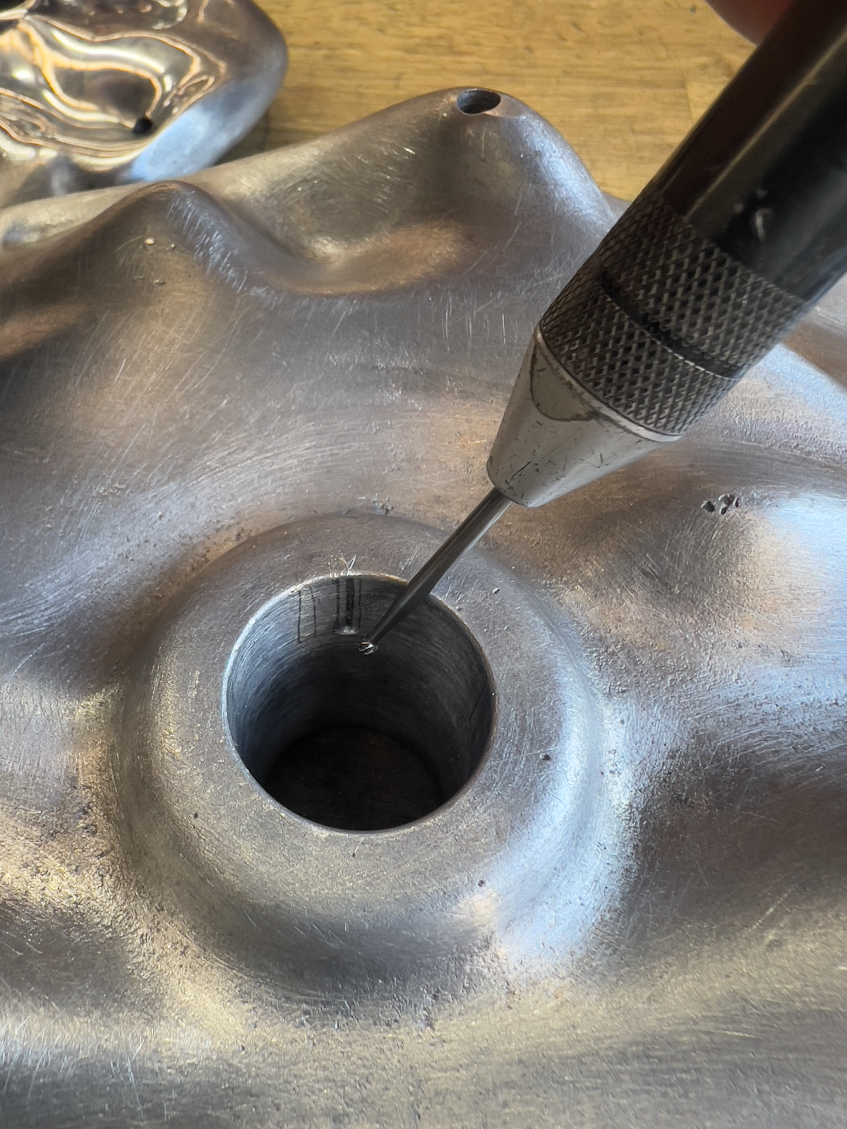 Using a dremel to add the detent for the ball detent.