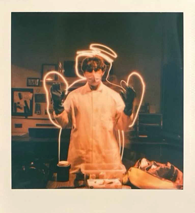 Photo of Robbie Skaff in a lab coat