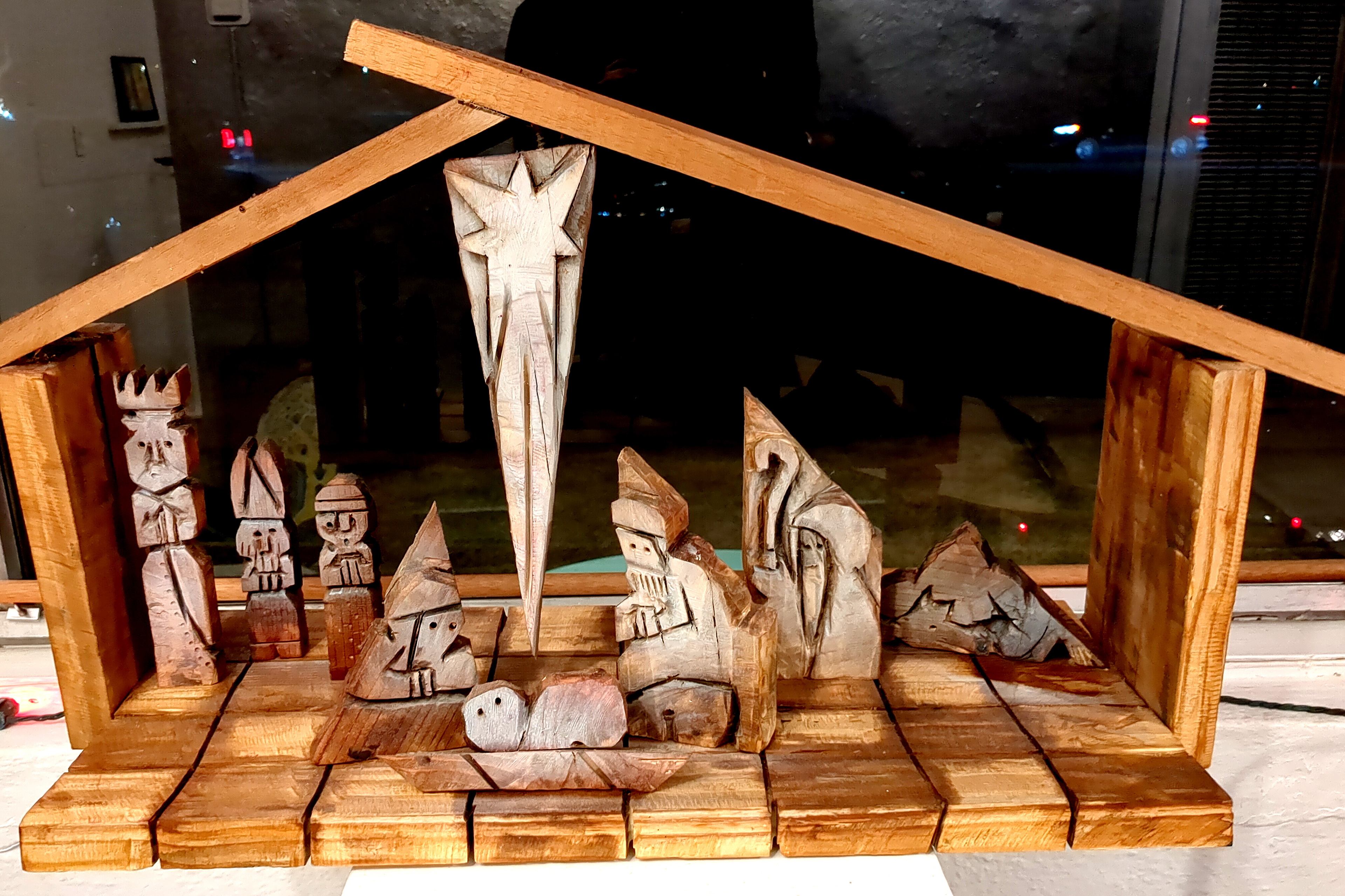 "Naivety Seen" (front) Aaron Sheppard, 2024 34 x 22 x 10 inches Wood stain, spray paint on carved wood with mirror