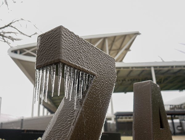 Ice hangs off a sign at Q2 Stadium in Austin, Tx.