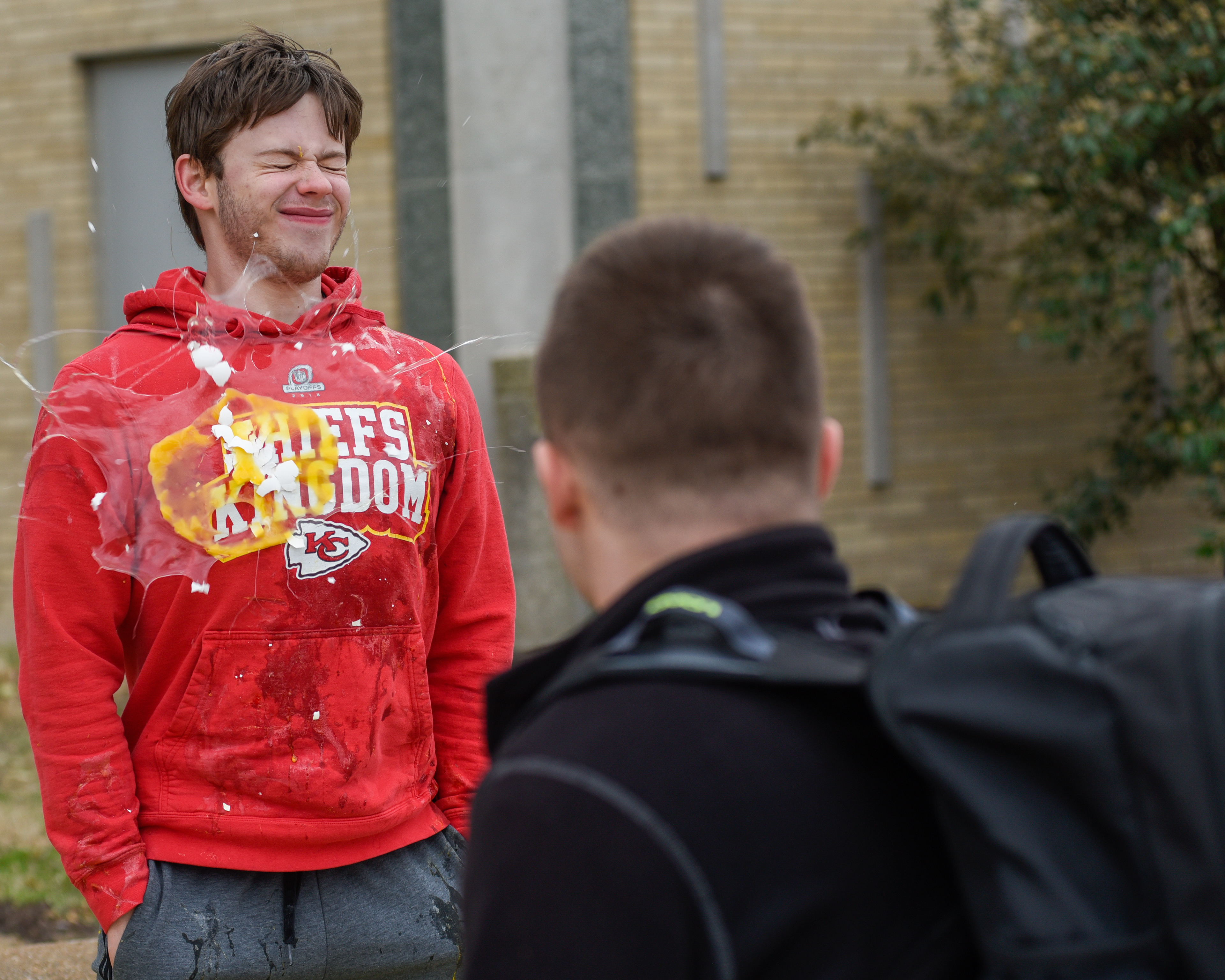 An egg makes impact with MU student Kennan Pindle’s sweatshirt April 7 at MU's Speakers Circle in Columbia. Pindle volunteered to help Tori Copto and Vlad Sazhen with their fundraiser for United Help Ukraine.