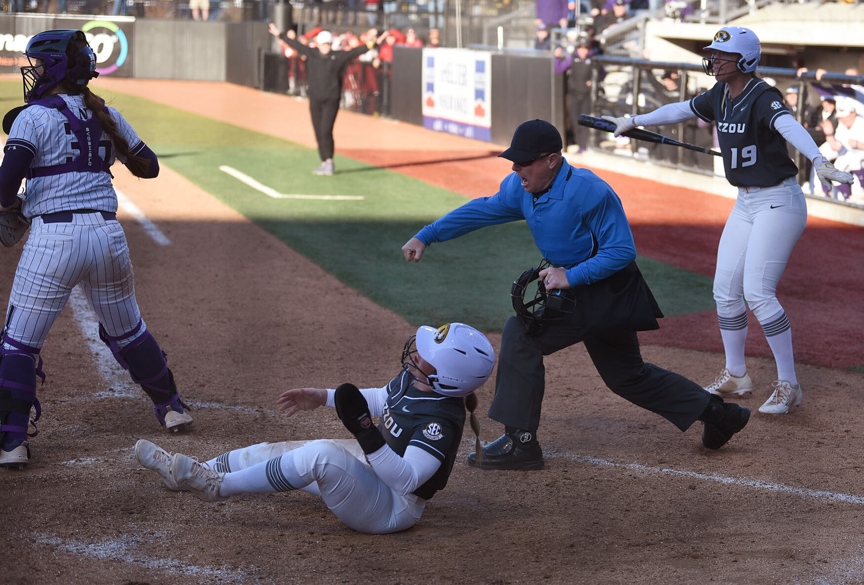 Brooke Wilmes is thrown out at the plate.