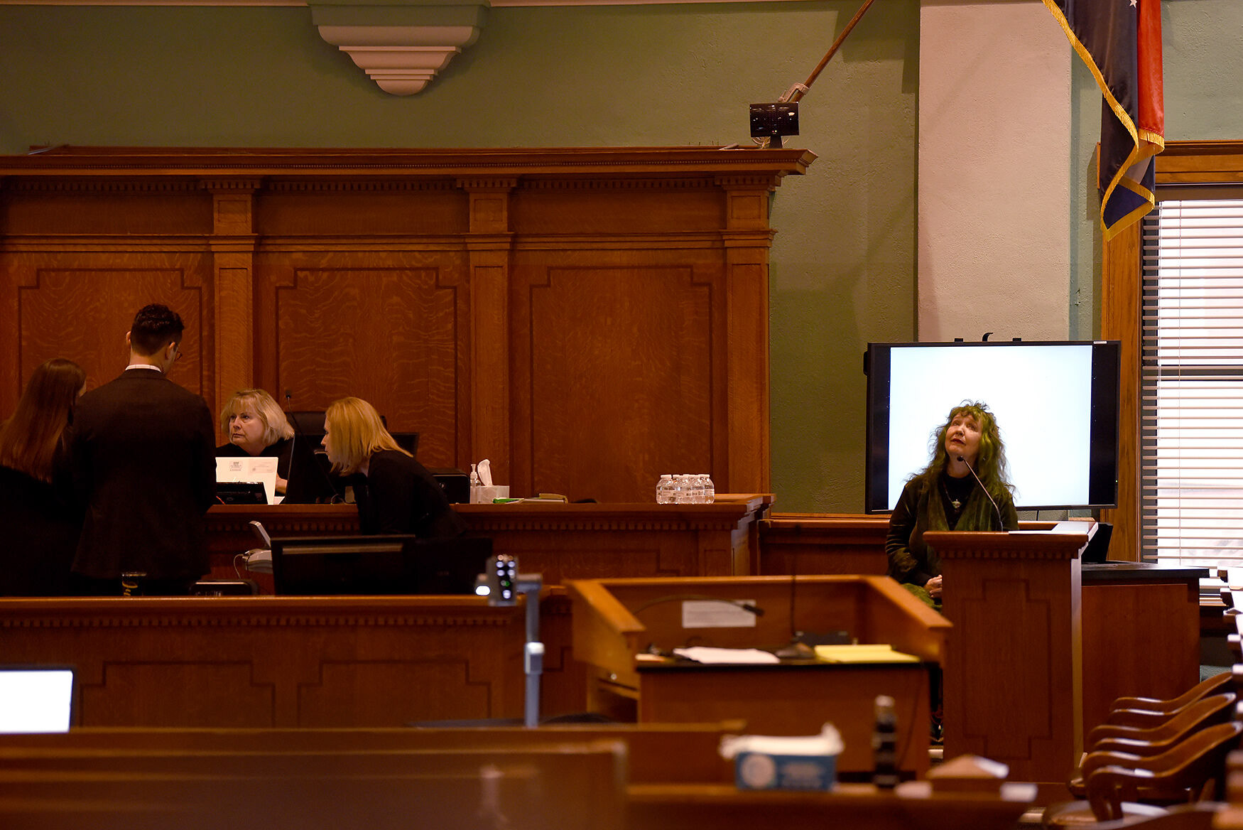Sutu Forté waits on the witness stand Thursday as attorneys for the state and defense approach.