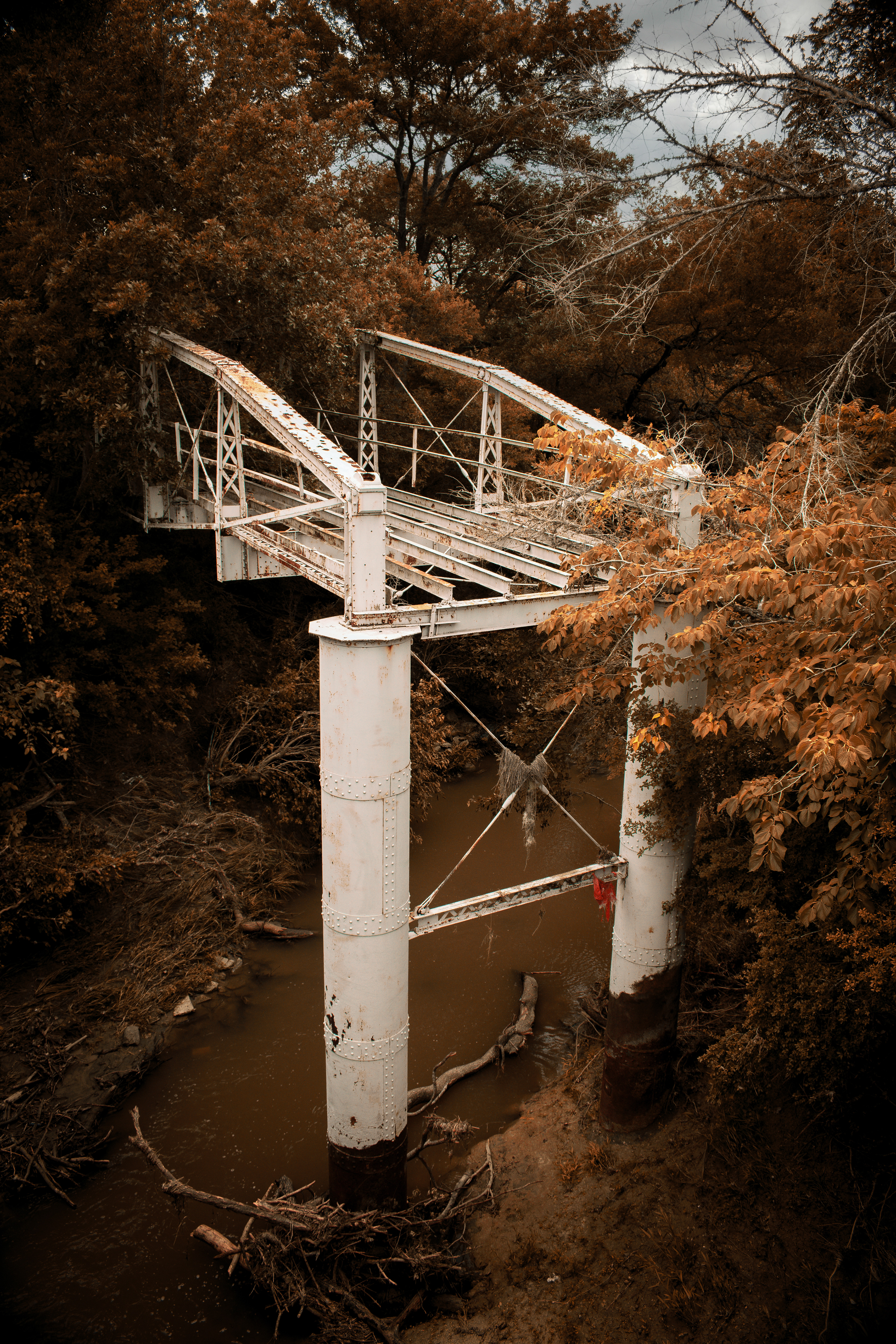 An abandoned bridge on a fall day in Central Texas