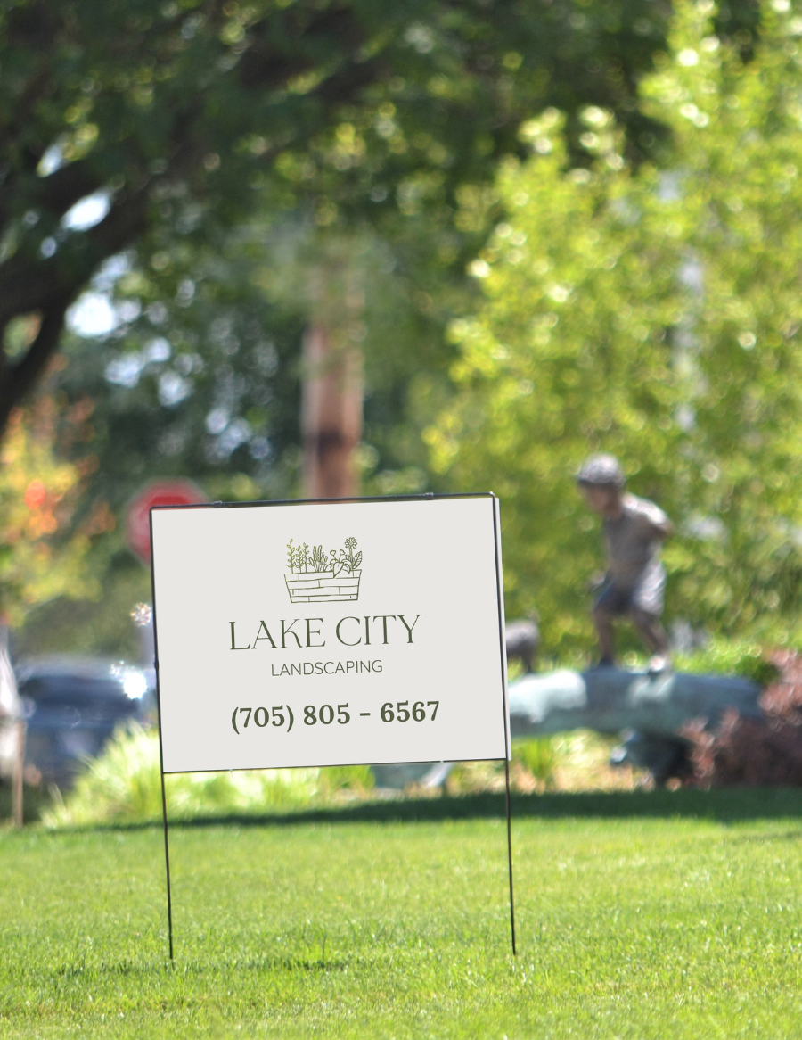 Sign advertising Lake City Landscaping on a lawn