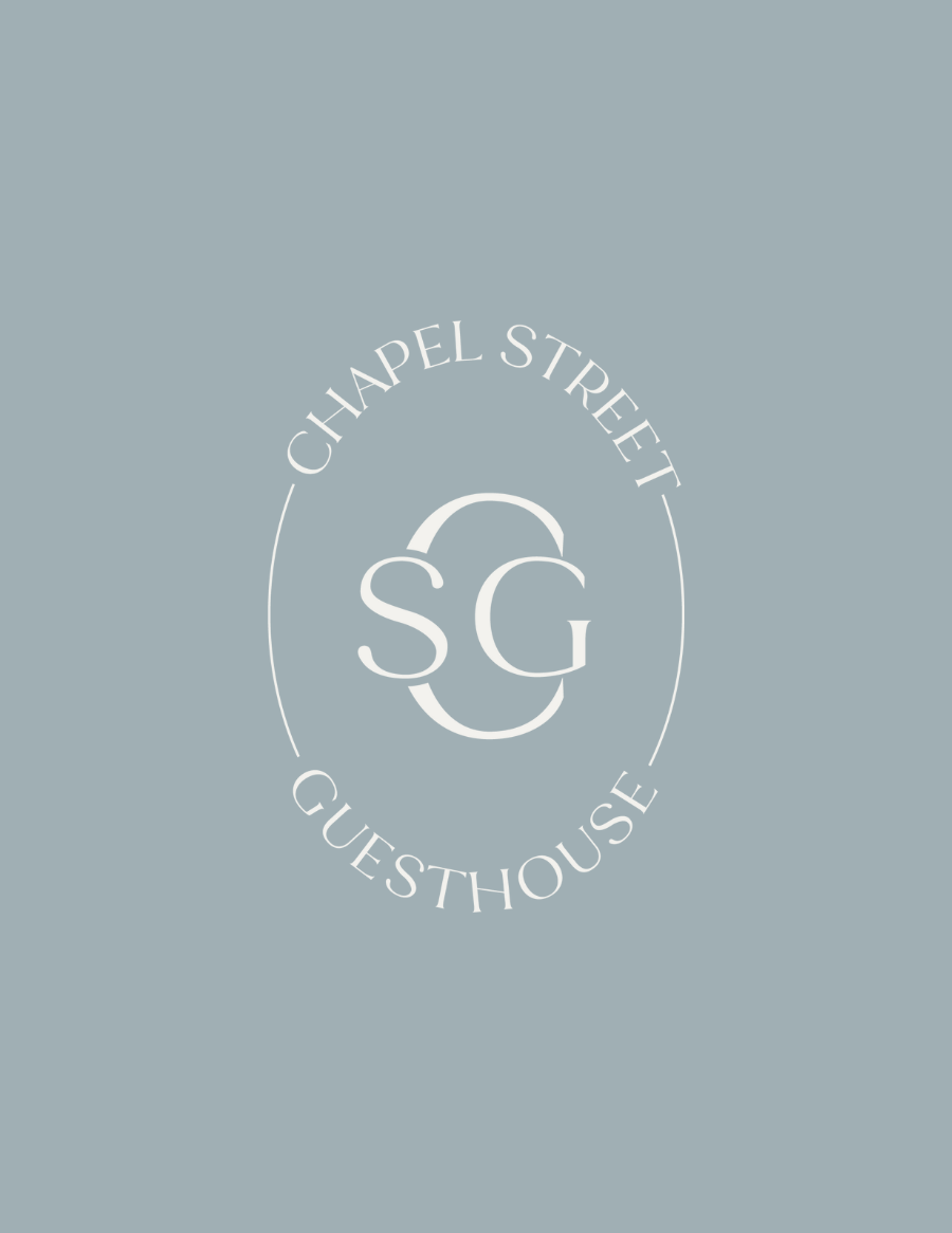 Chapel Street Guesthouse round logo mark on a light blue background