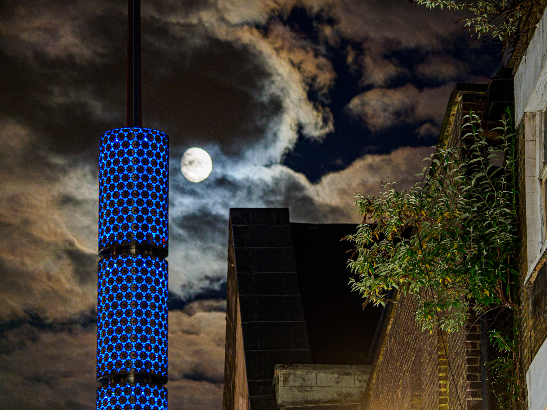 Streets of London - man in suit watching stairway entrance, London, England