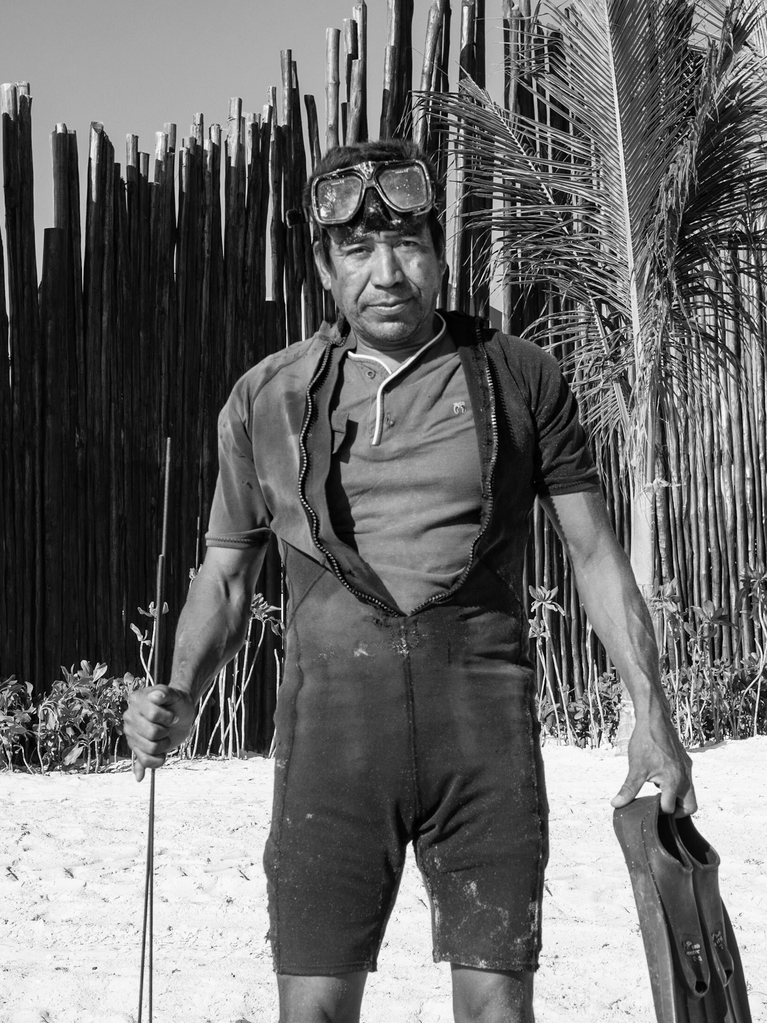 Spear fisher on the beach, Playa Del Carmen, Mexico