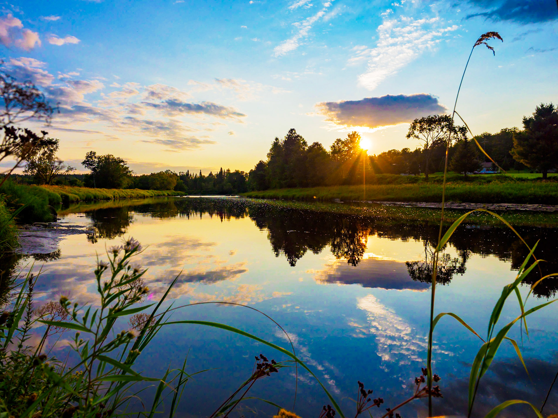 Sunset over the slow river - somewhere in Quebec, Canada