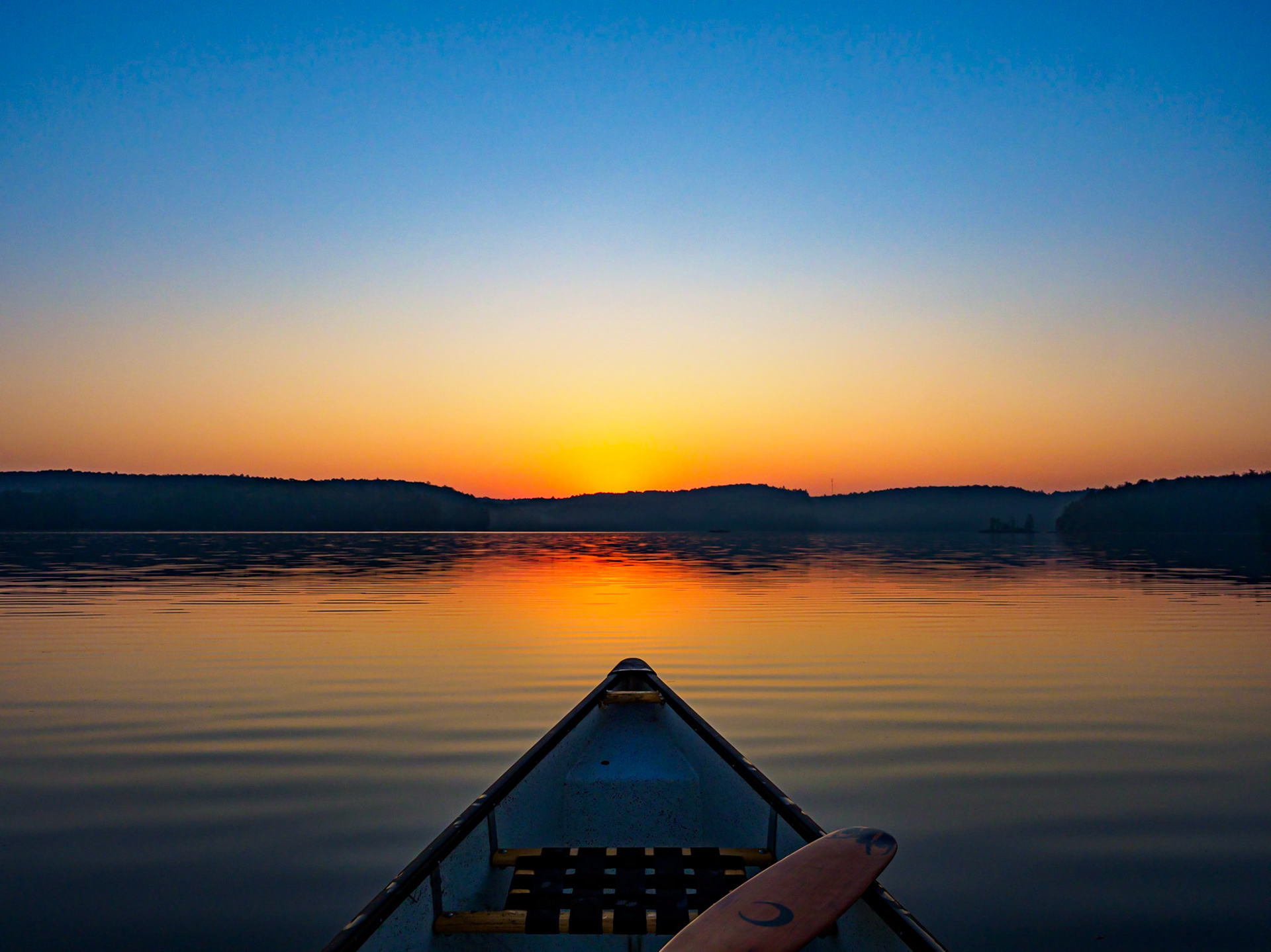 Kennisis Lake sunrise by Canoe, Haliburton, Ontario