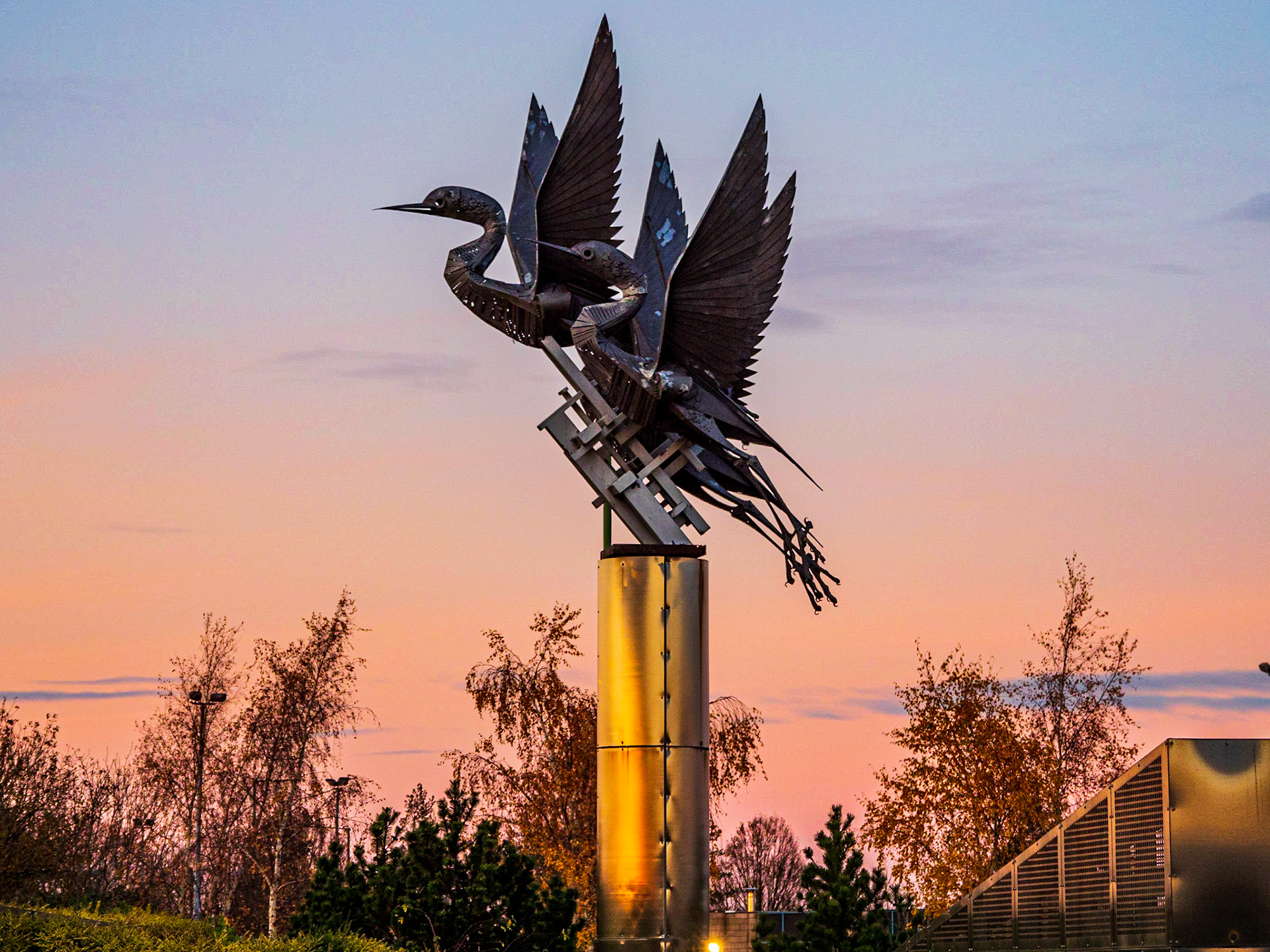 Take Off, a metal sculpture featuring three egrets taking flight, is a prominent feature that greets visitors approaching Birmingham Airport by road. Positioned on a roundabout known as Bird Island, the twenty-eight foot high sculpture, constructed of mild steel, was created by Polish sculptor Walenty Pytel in 1985, to commemorate 40 years of peace in Europe. Pytel is widely regarded as one of the world's leading metal sculptors.