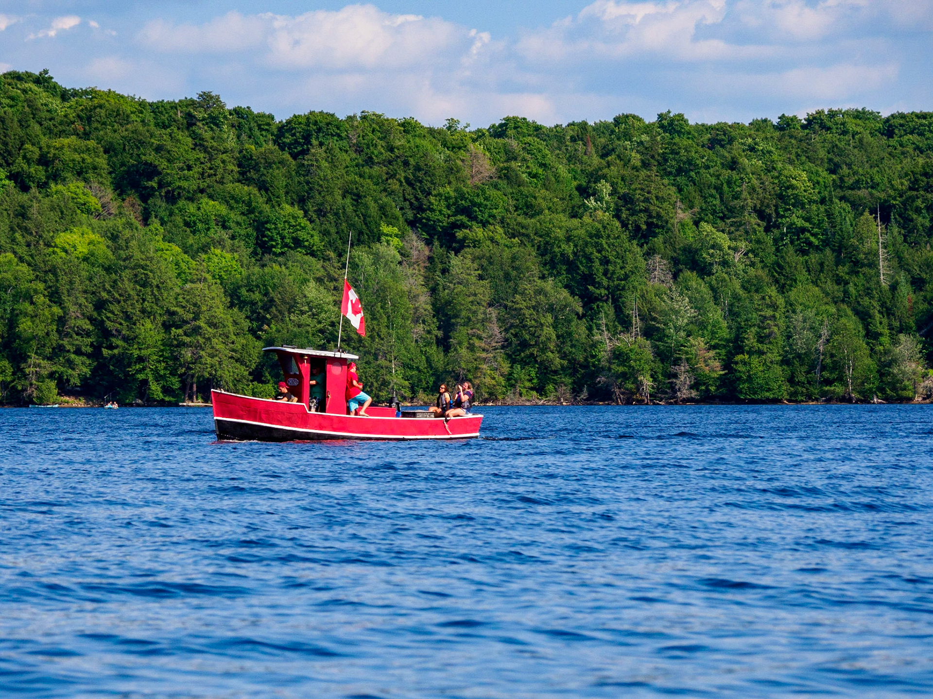 Red Tug Boat in Little Kennisis Lake, Haliburton, Ontario