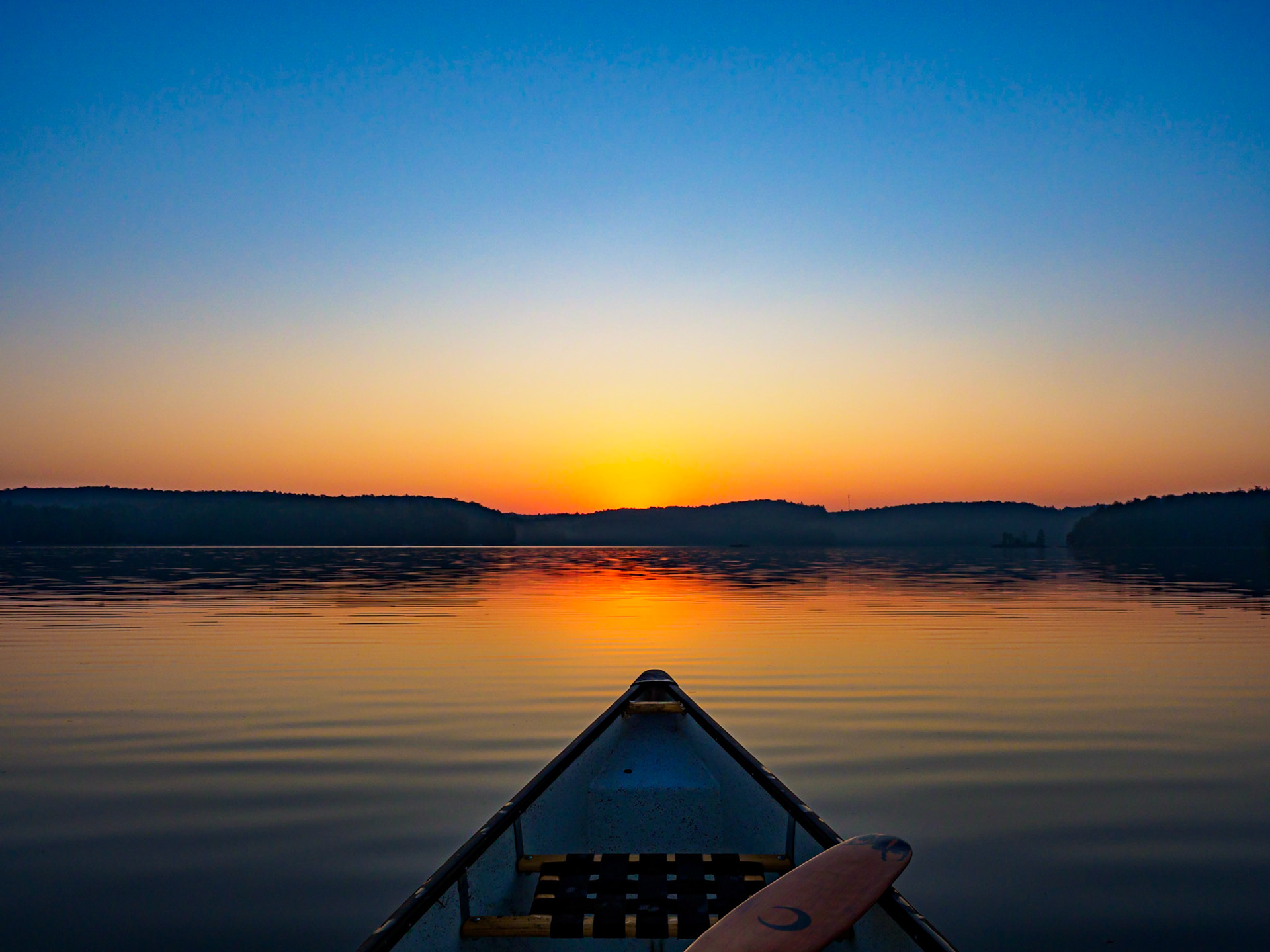 Kennisis Lake sunrise by Canoe, Haliburton, Ontario