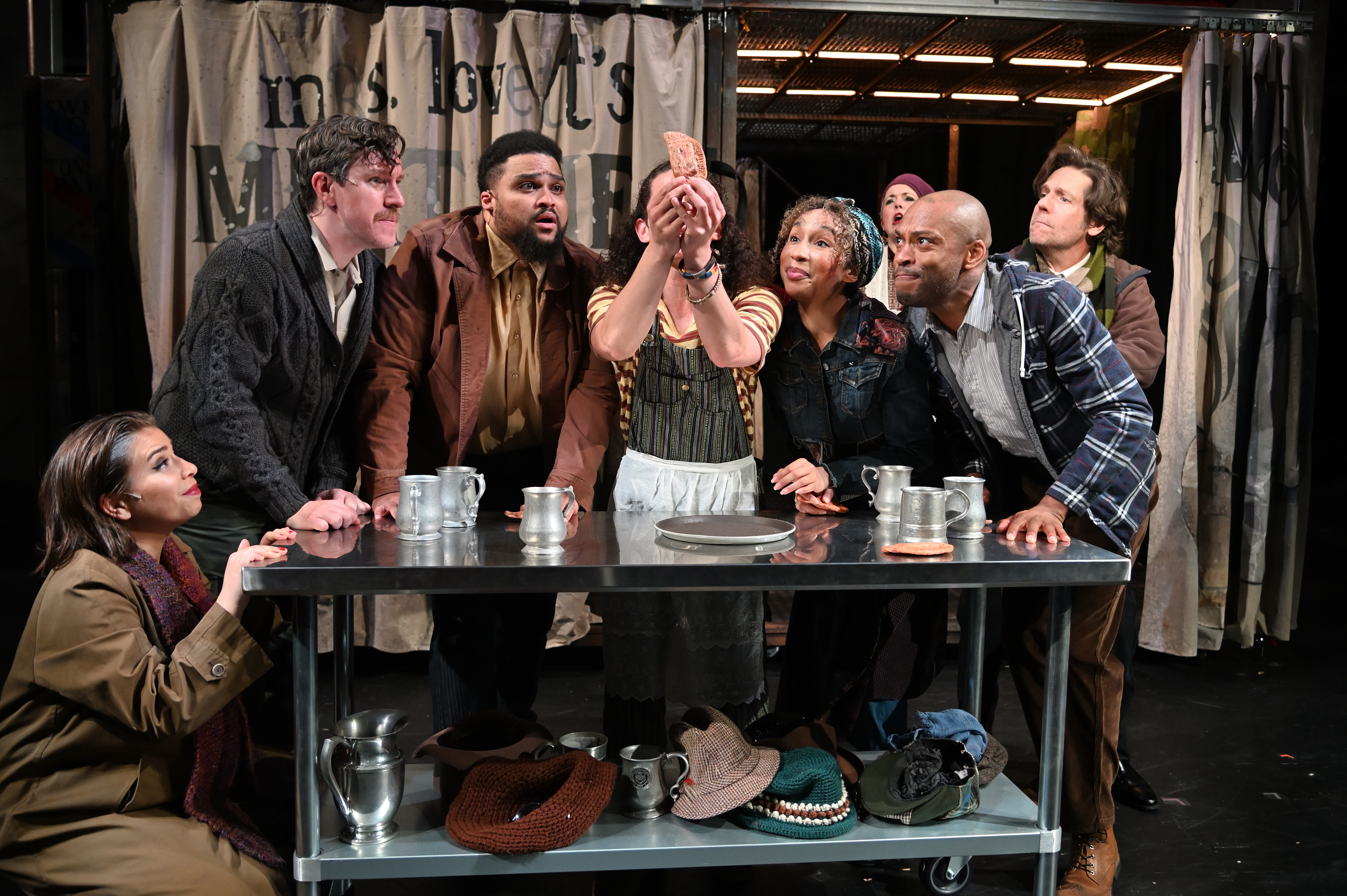 From Left: SOPHIE ZMORROD, KEVIN PATRICK MARTIN, KAI THOMANI TKSHOSI as Pie shop Customers, ALEXANDER CRESPO-ROSARIO II as "Tobias", REBECCA-ANNE WHITAKAR, TAAVON GAMBLE and STEPHEN THORNE as Pie Shop Customers