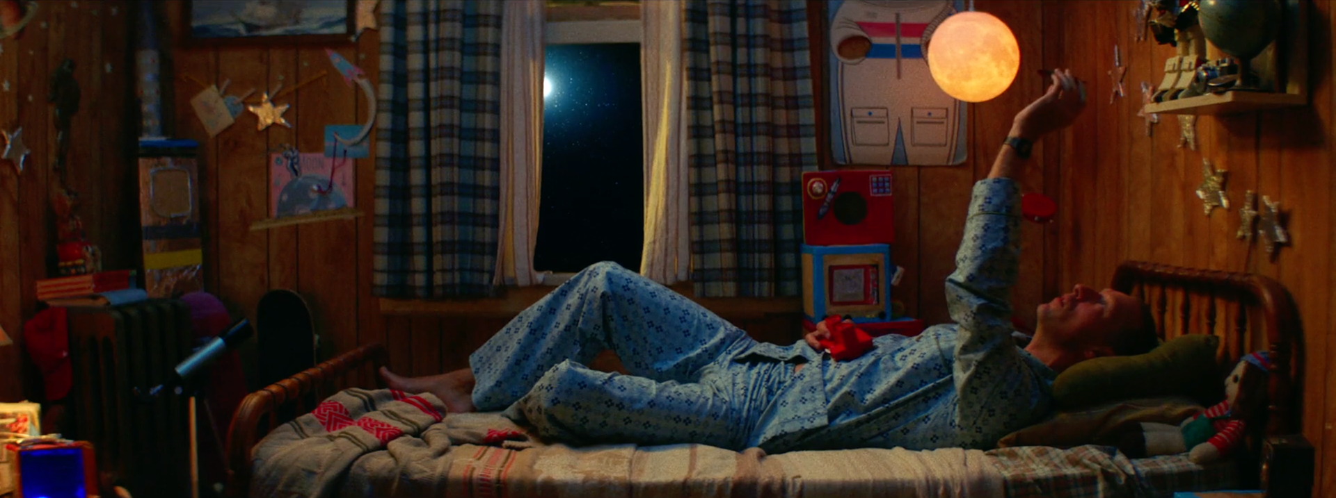 Chris Martin room with space posters