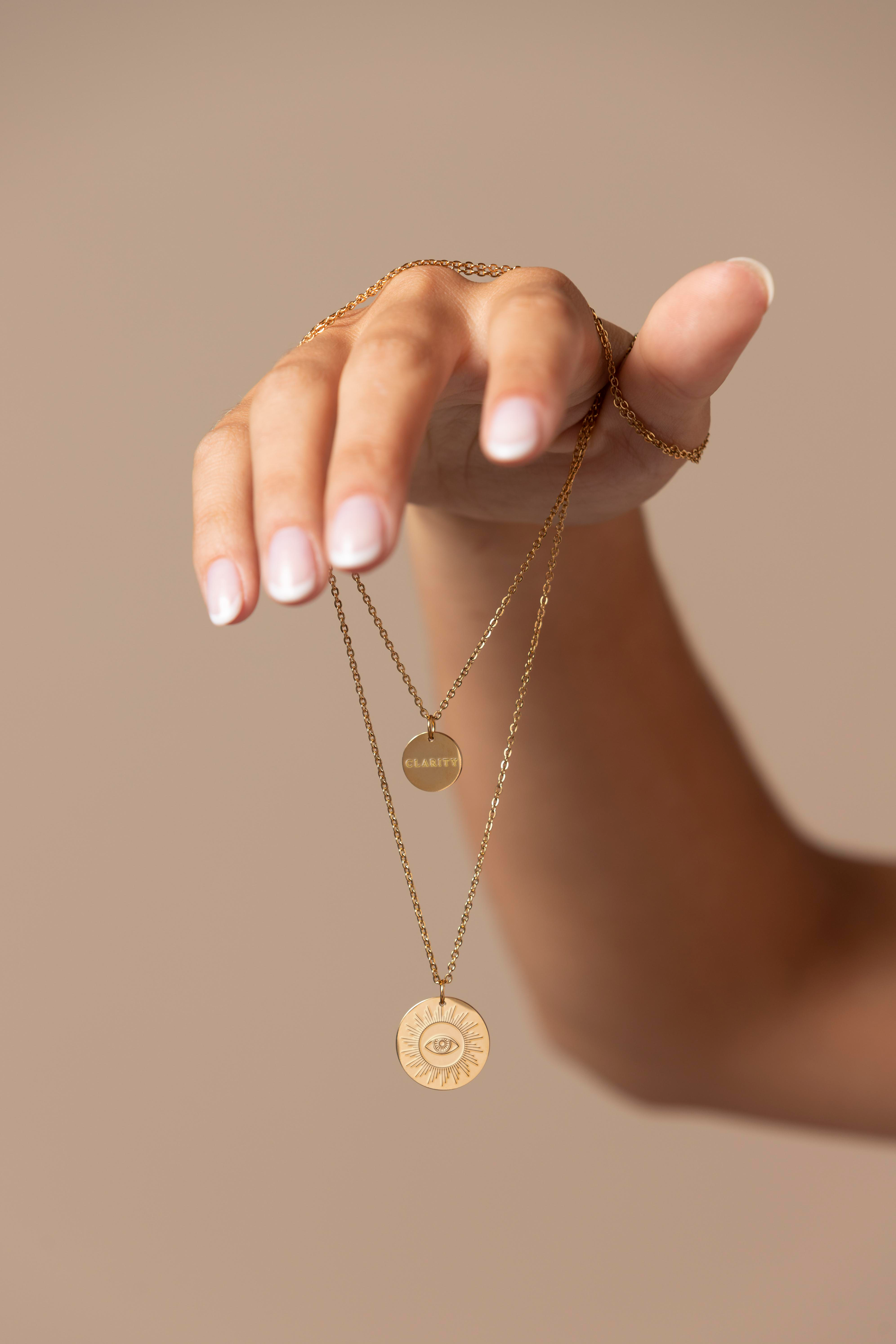 Logo necklace design for Tania Karam-Clarity course