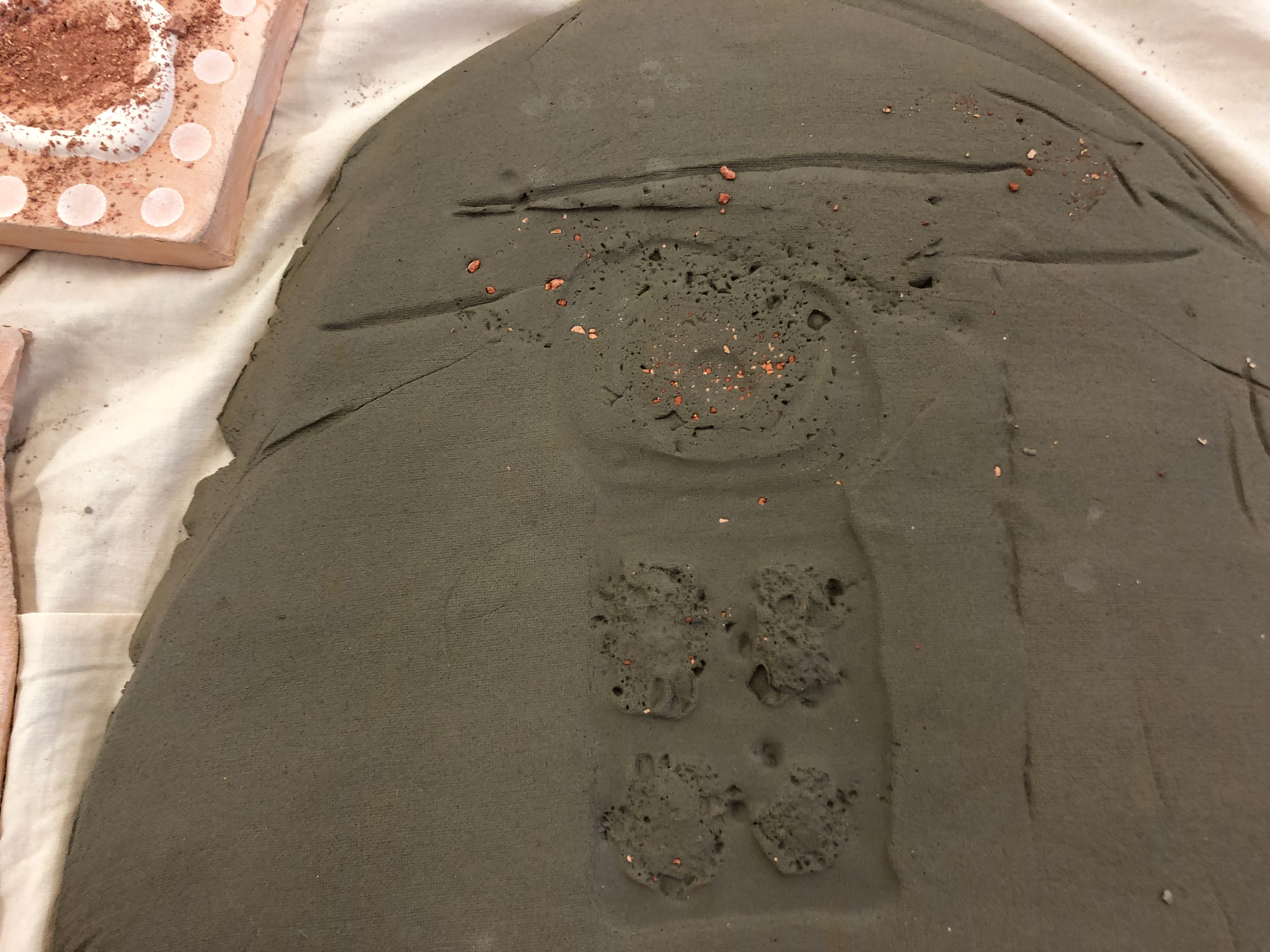 Imprint of a different crushed clay and slip