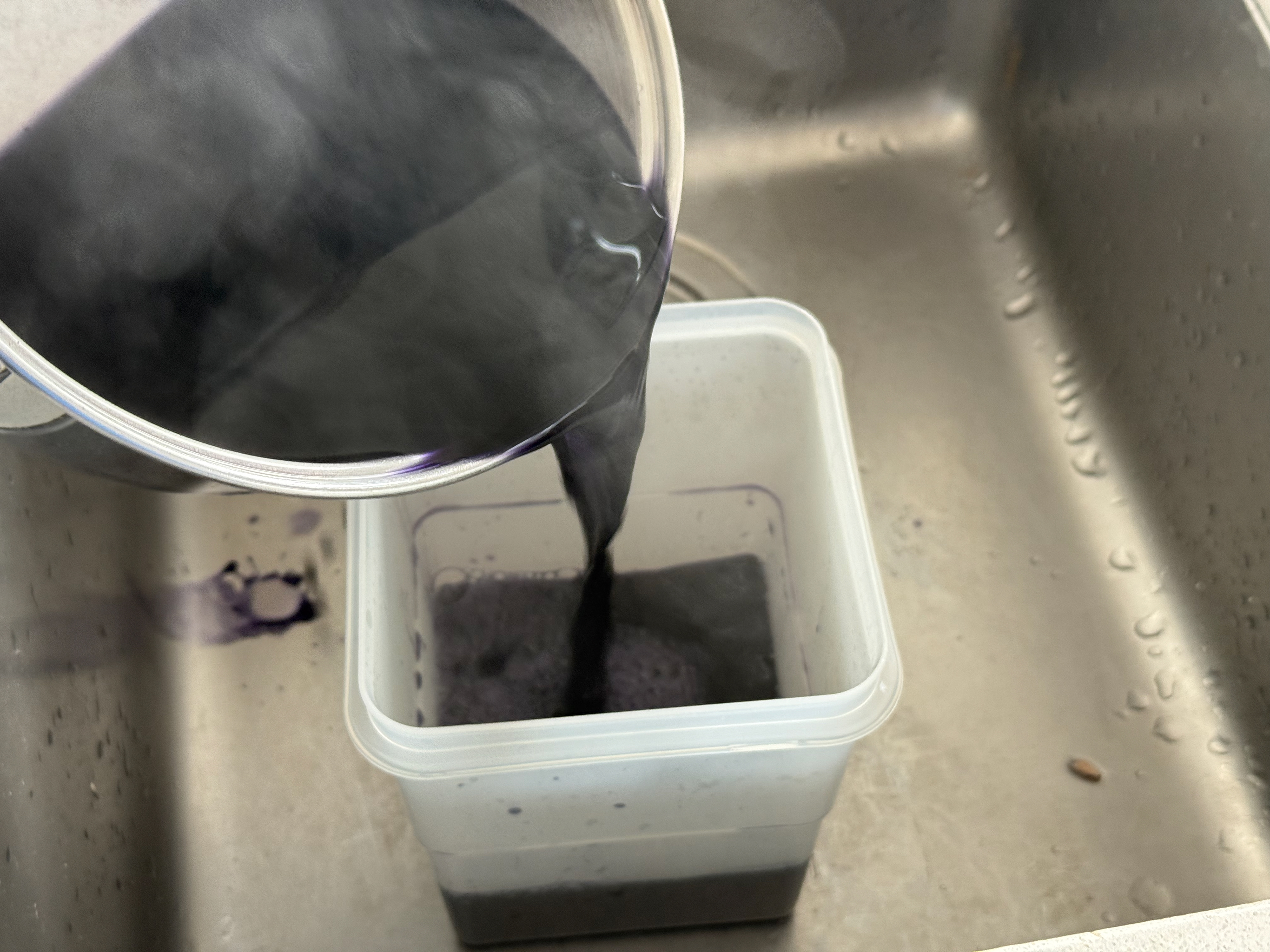 Pour liquid into container for reuse later on.