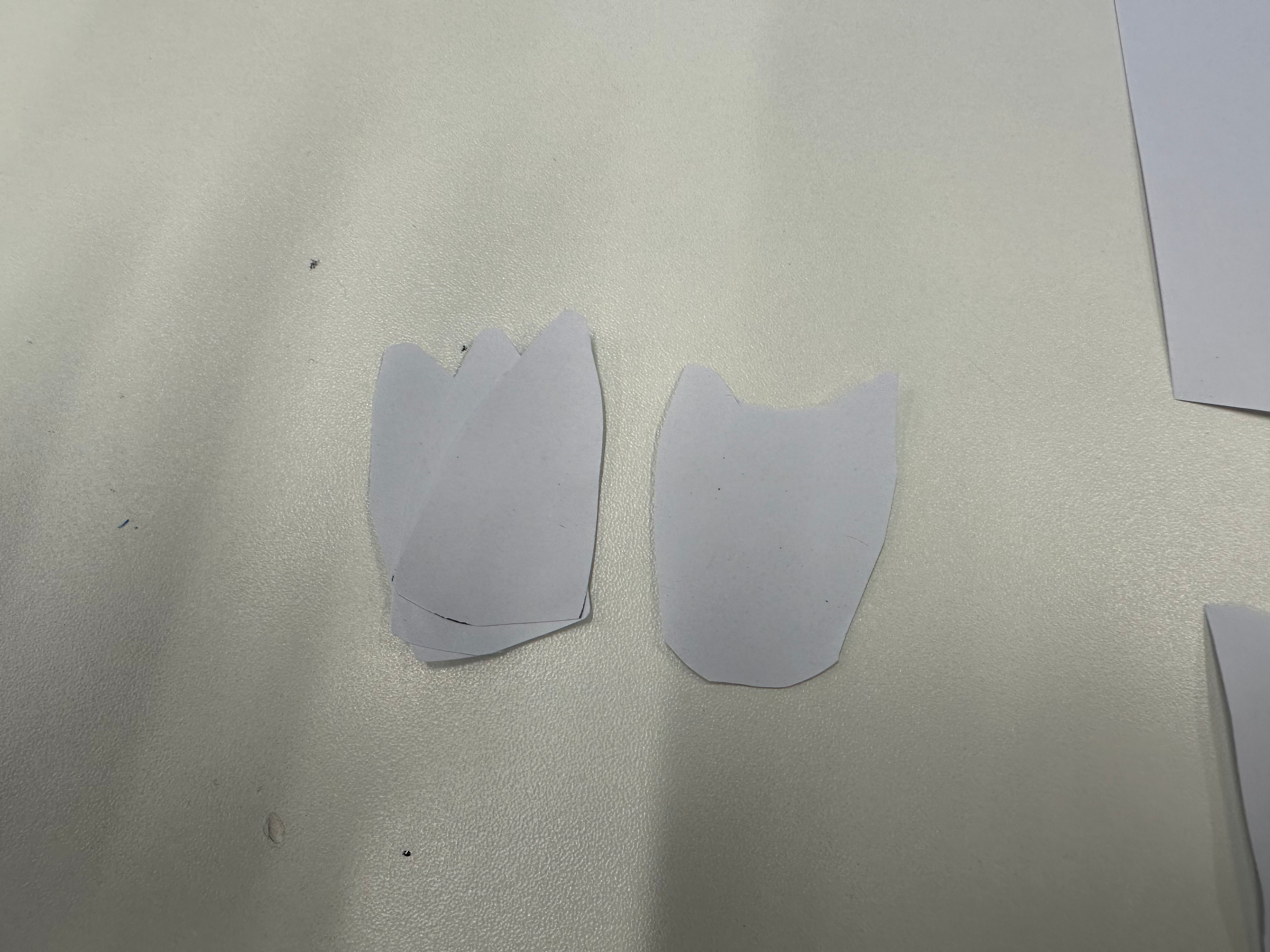 Cutting out a design, similar to the fan, that can be thrown.