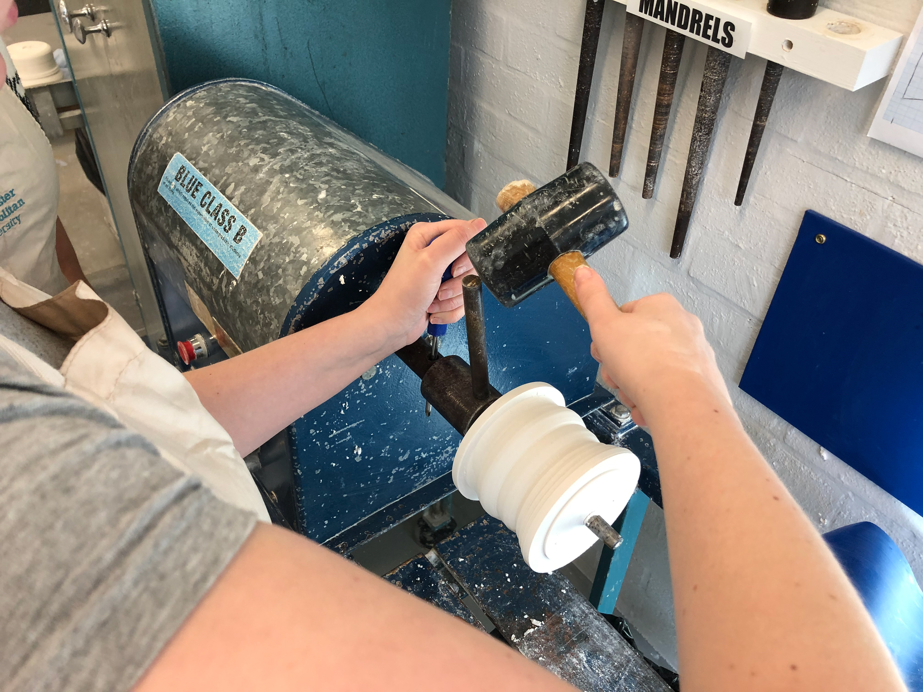 Use a mallet to carefully unscrew the mandrel. Then pull the plaster off the mandrel.
