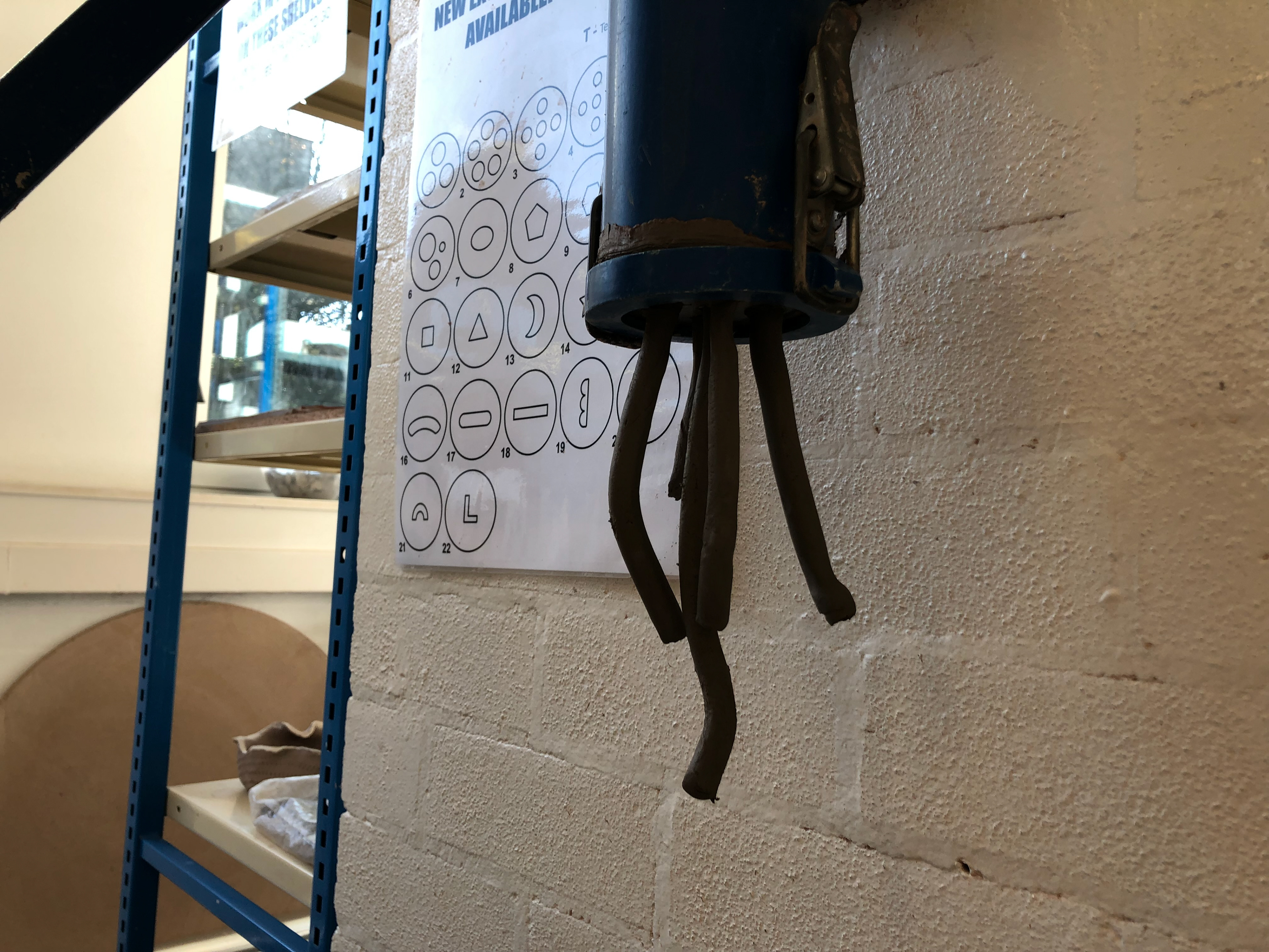 The extruder partially pressed down.