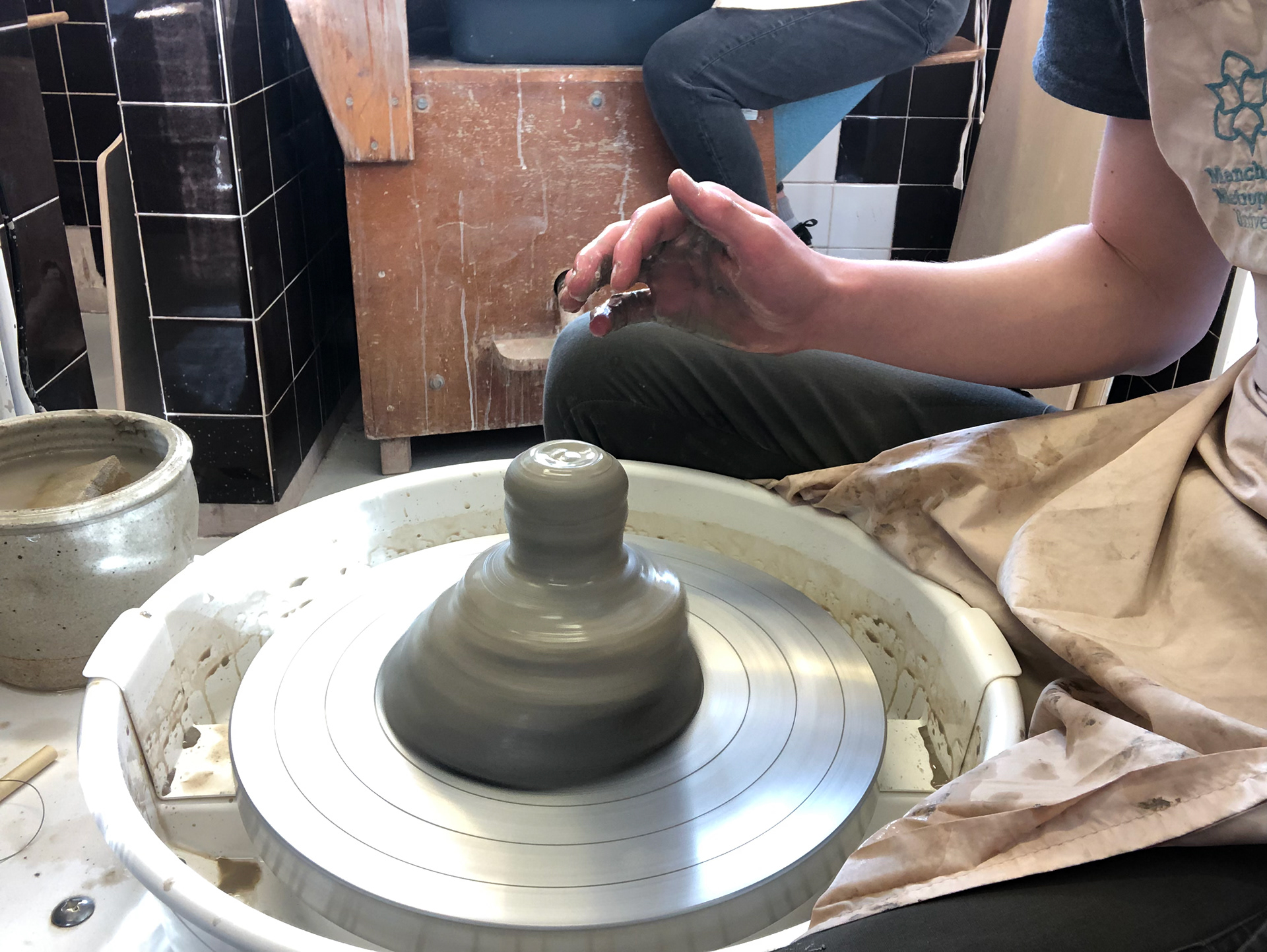 Forming the first pot.