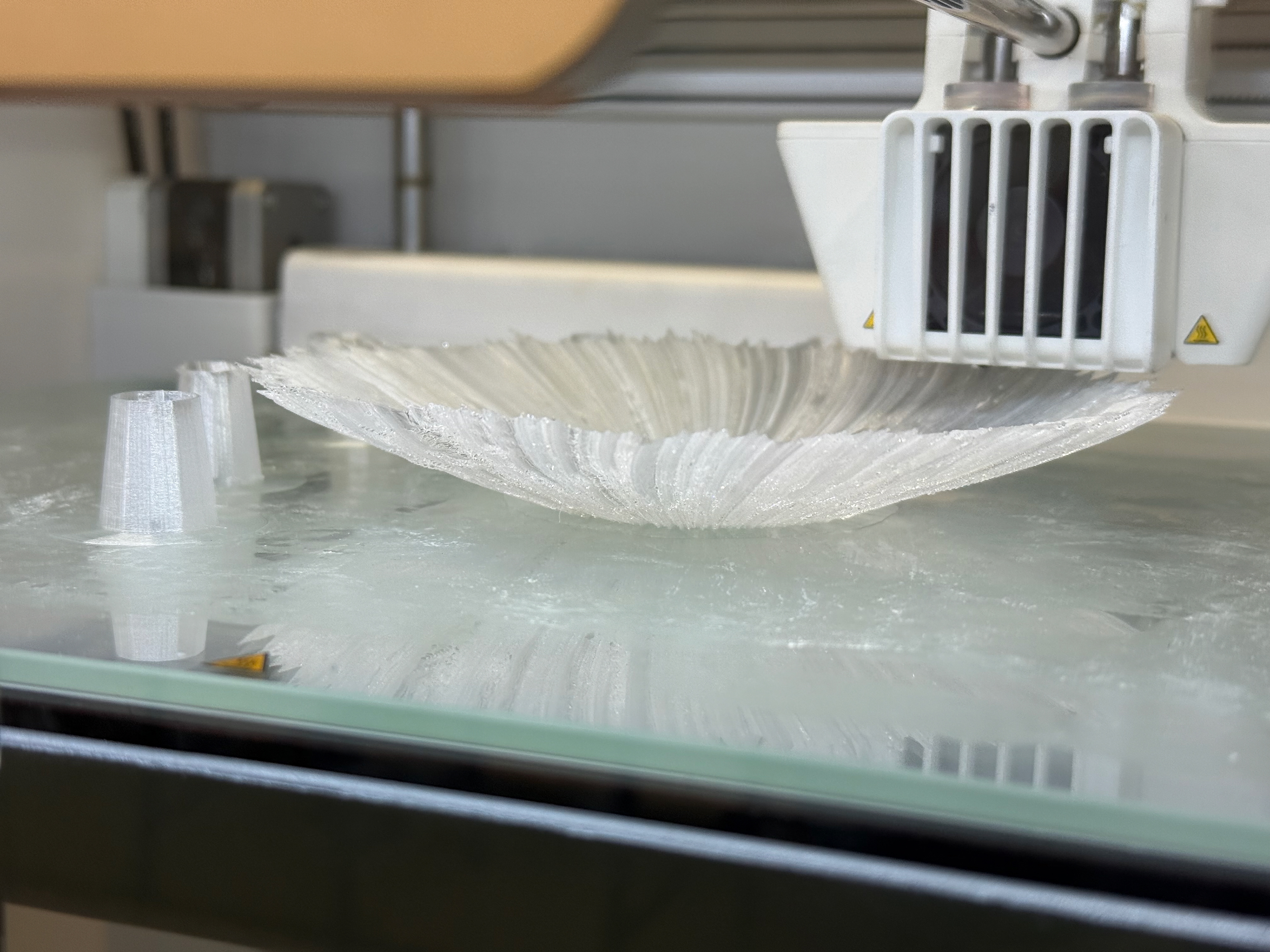 At this point in the print, I noticed a small issue - the print was flexing up which caused the extruder and casing to slightly catch on the side however it hadn't done any damage so I left it