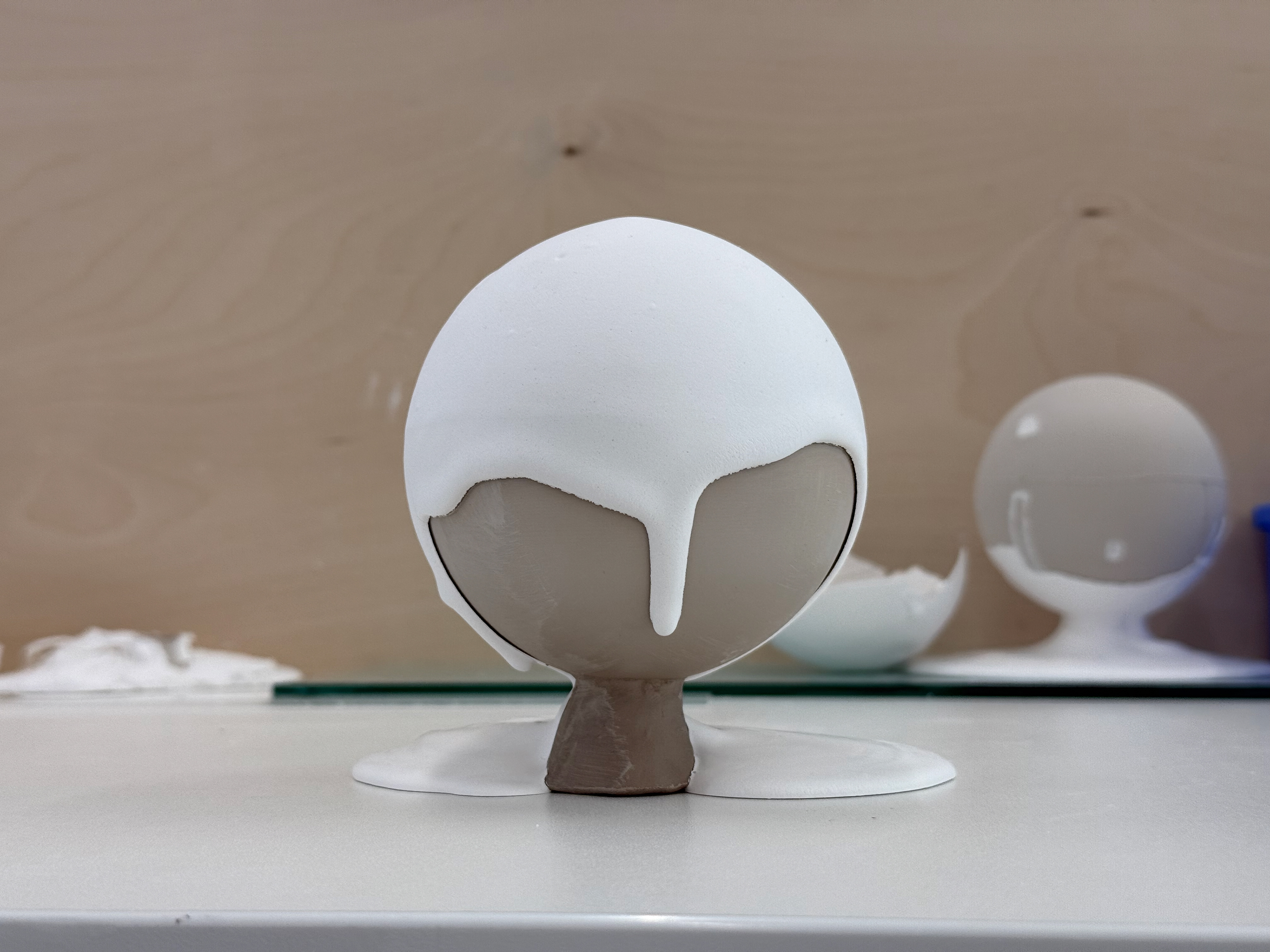 Helmet of plaster over the ball.