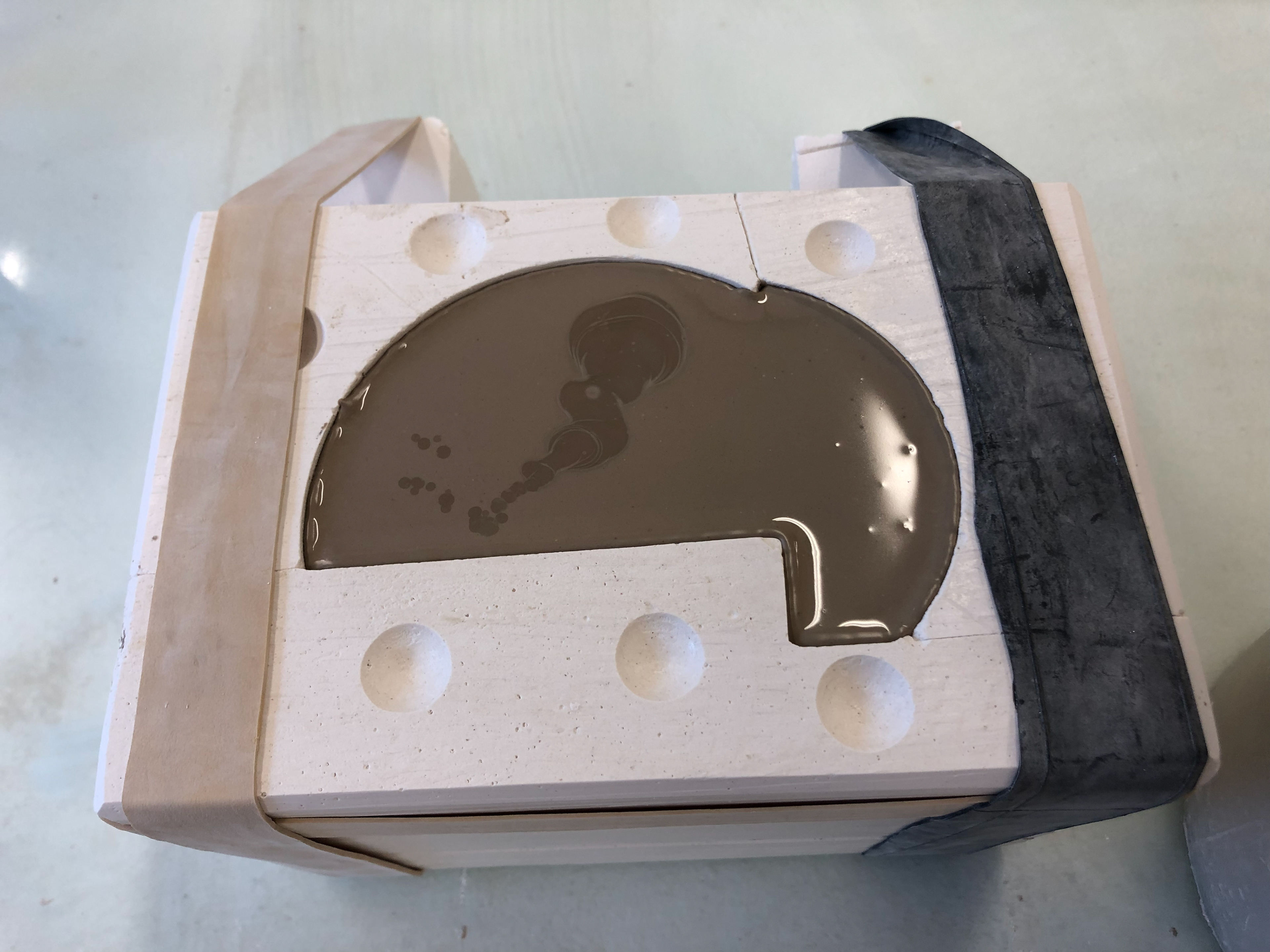 Slip poured into mould.