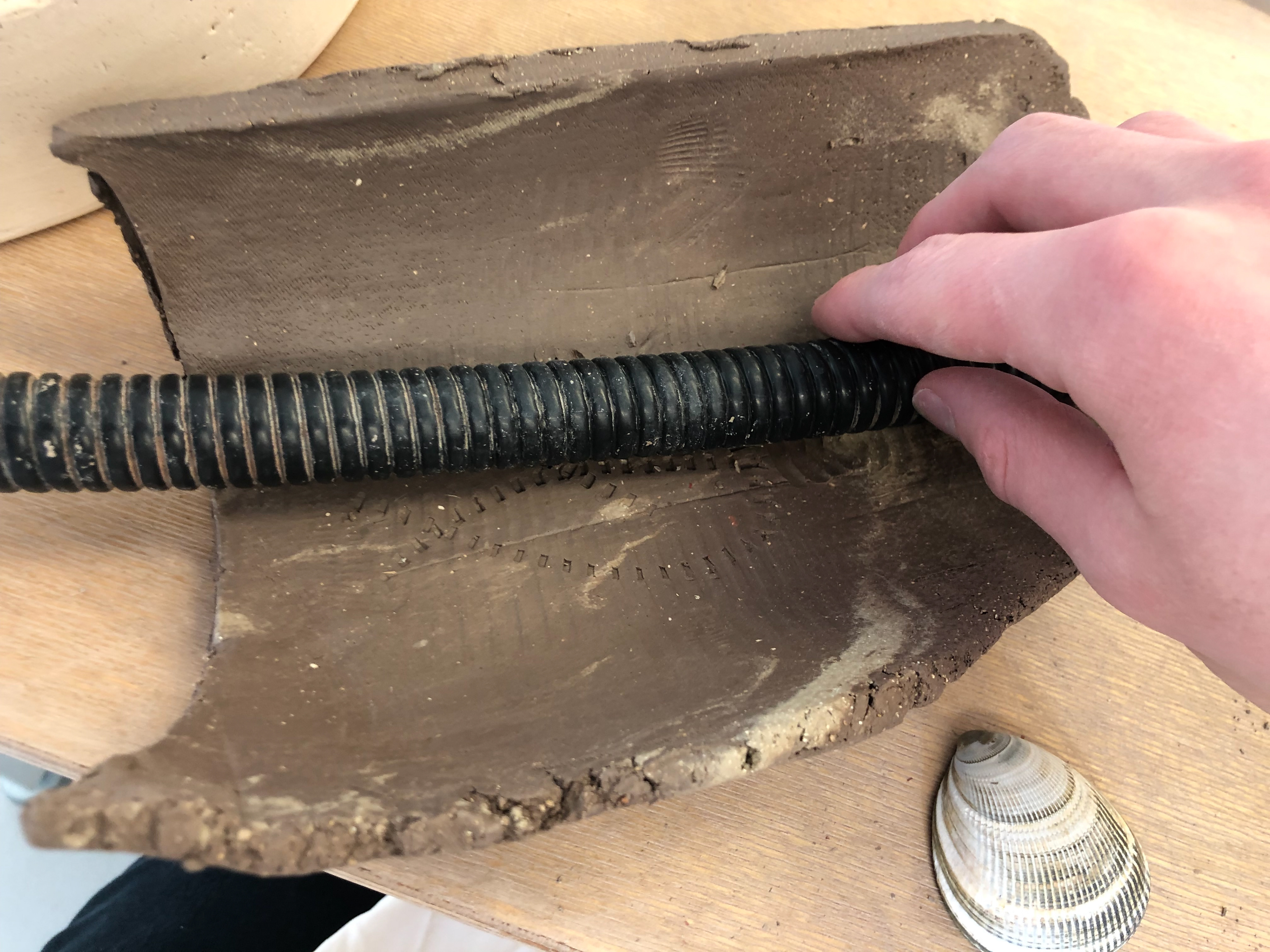 Piping which I slapped into the clay left a deep imprint.