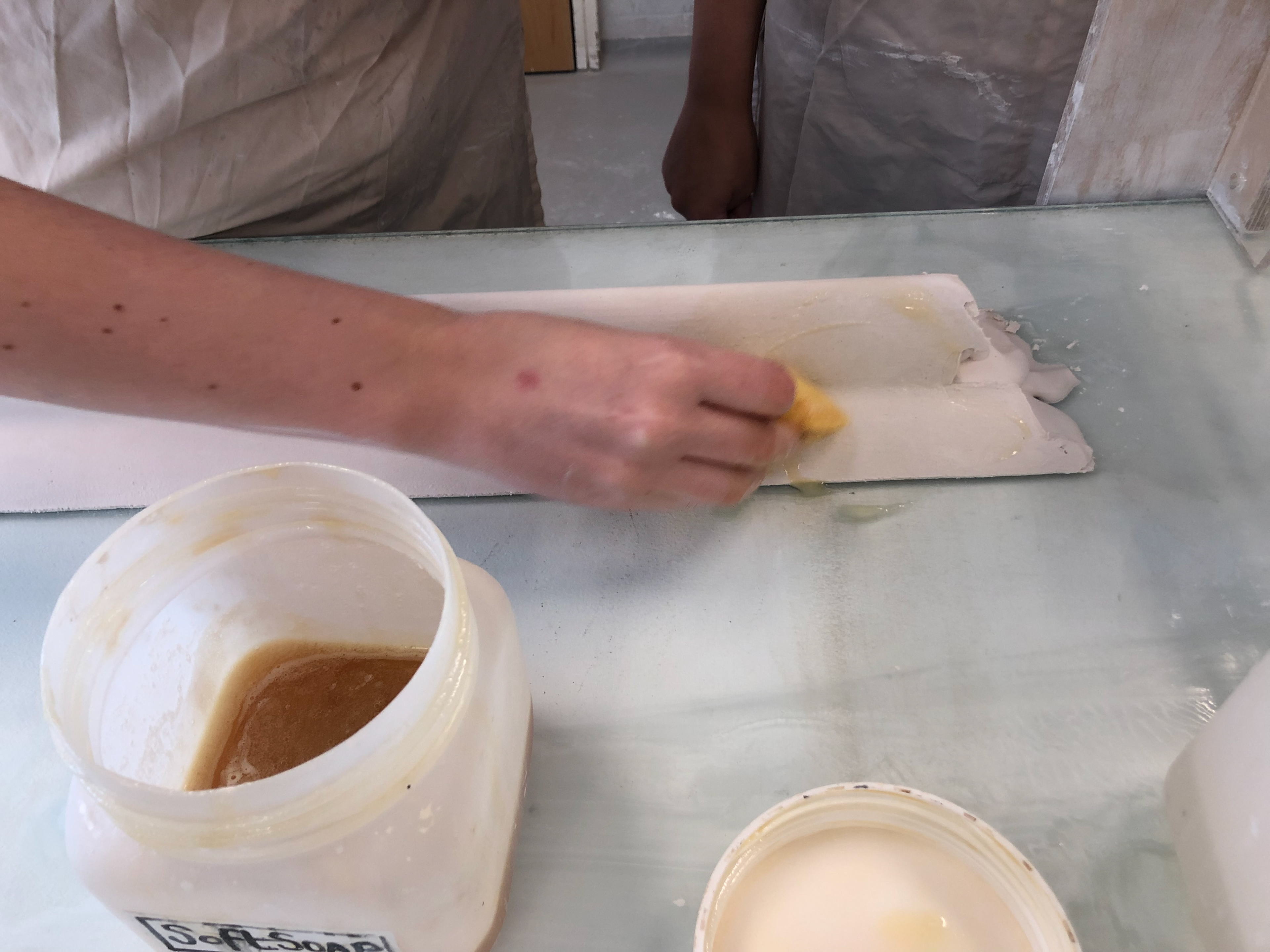 Wiping soft soap over the plaster and wiping with water (repeated 4 times) to prevent the top section from joining